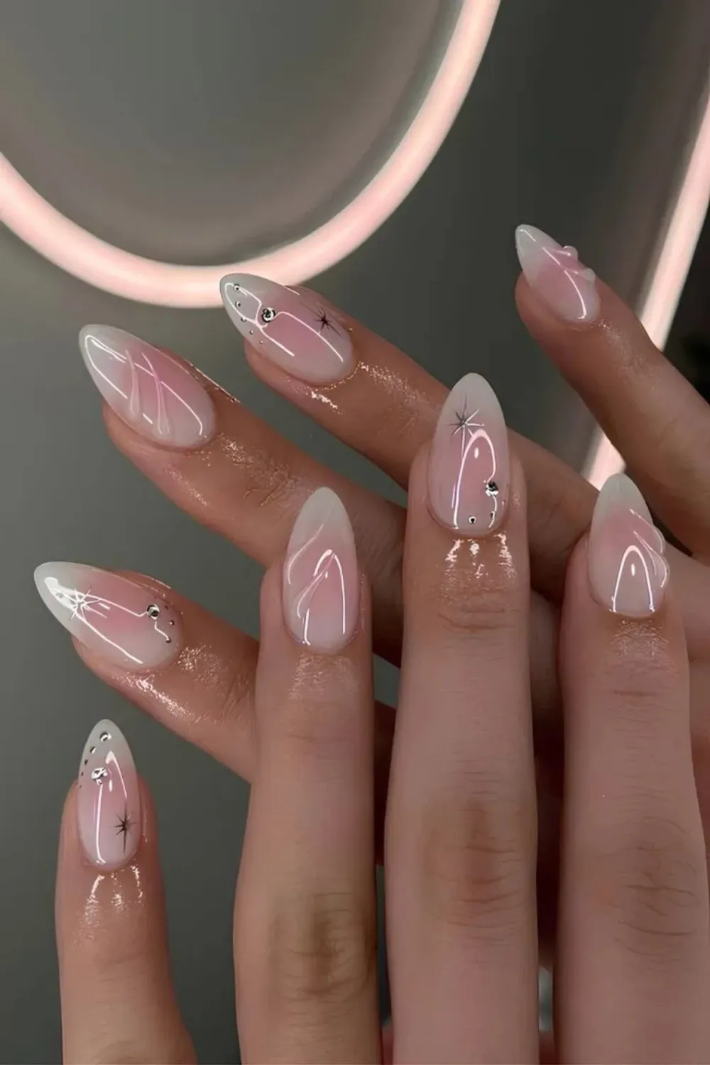 Soft Pink Aura Nails – Gradient pink tones for a halo effect.