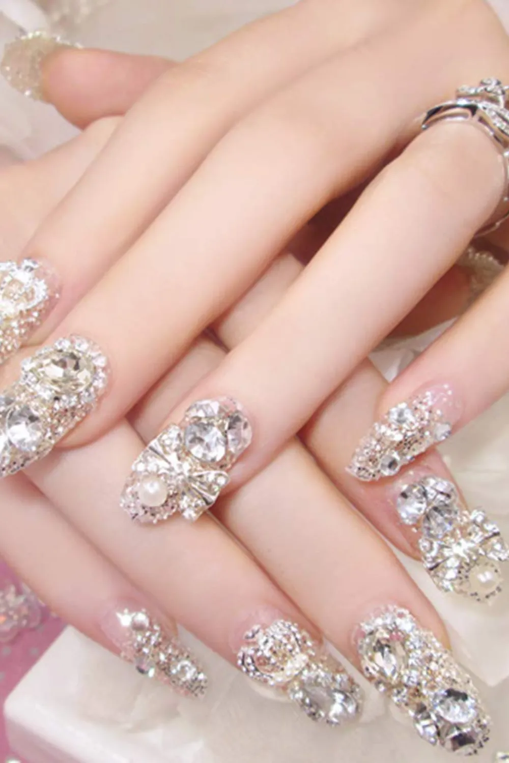 Luxury Bridal Nails with Oversized Crystal Embellishments - Long wedding nails with heavy crystal embellishments and pearl details