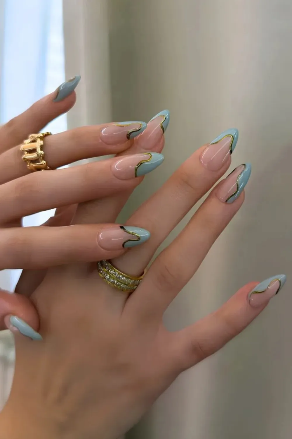 Abstract Blue & Gold French Tips – Teal and gold abstract art on French tips.
