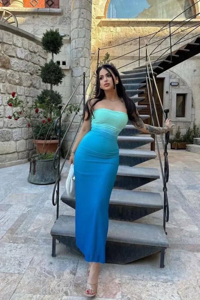 Blue Ombre Strapless Bodycon Dress - Woman in a strapless bodycon ombre dress with turquoise-to-blue gradient.