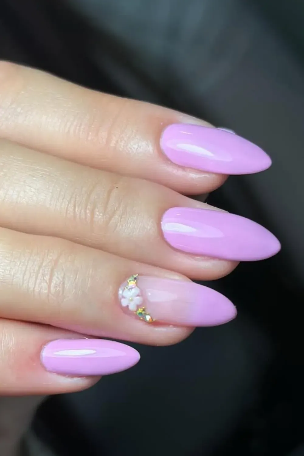 Delicate floral design with hand-painted pink and white flowers on soft nude nails.