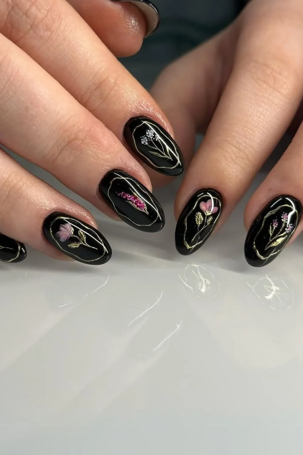 "Black Nails with Delicate Flower Art - Elegant Dark Floral Manicure"