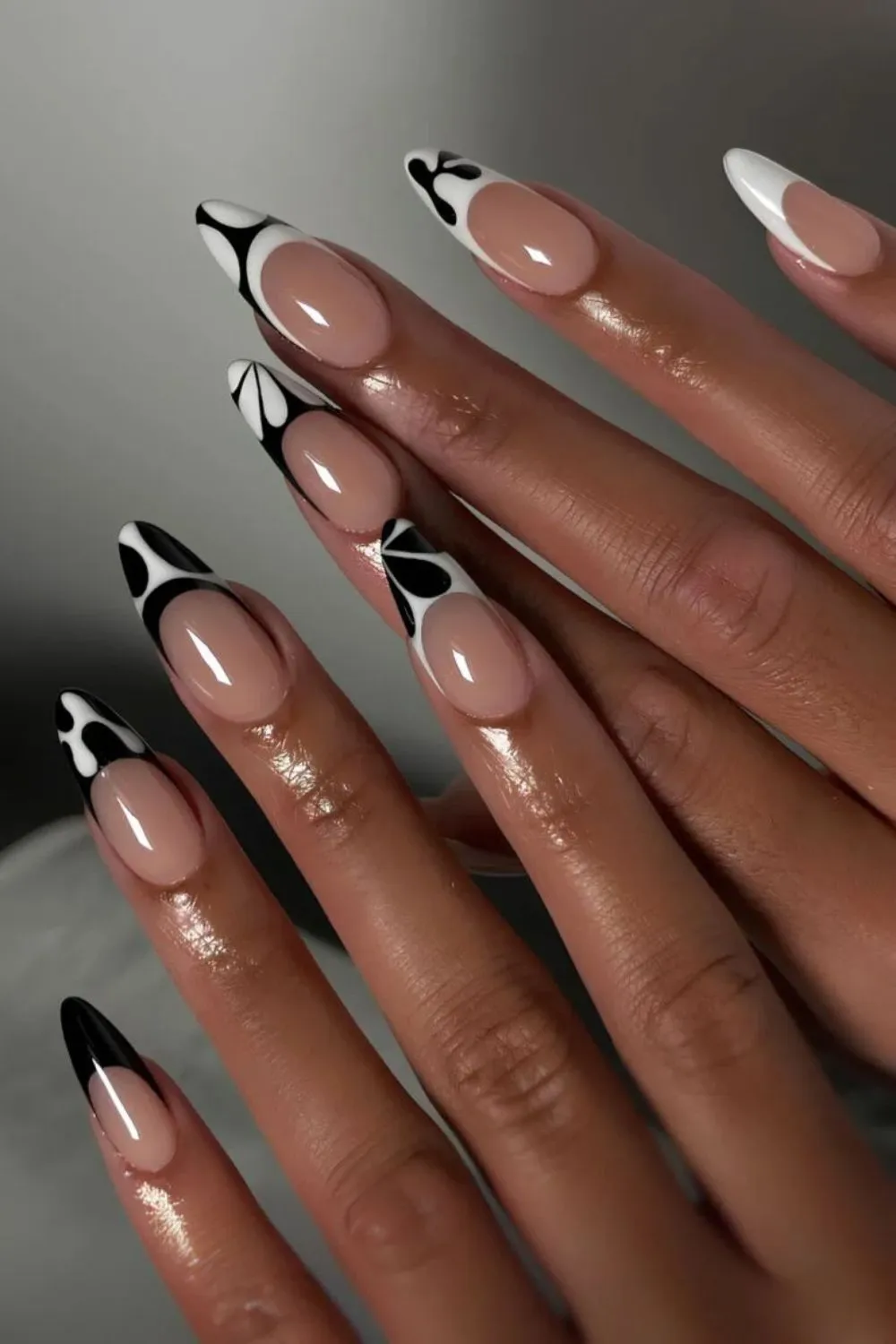 Nude and Black Swirl Nails – Chic Abstract Design With Contrast Swirls