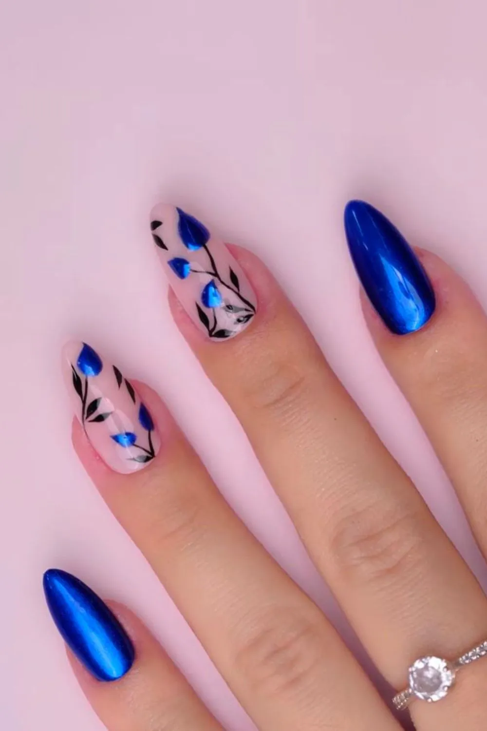 "Blue Chrome and Floral Nail Design - Bold Meets Elegant Nail Art"
