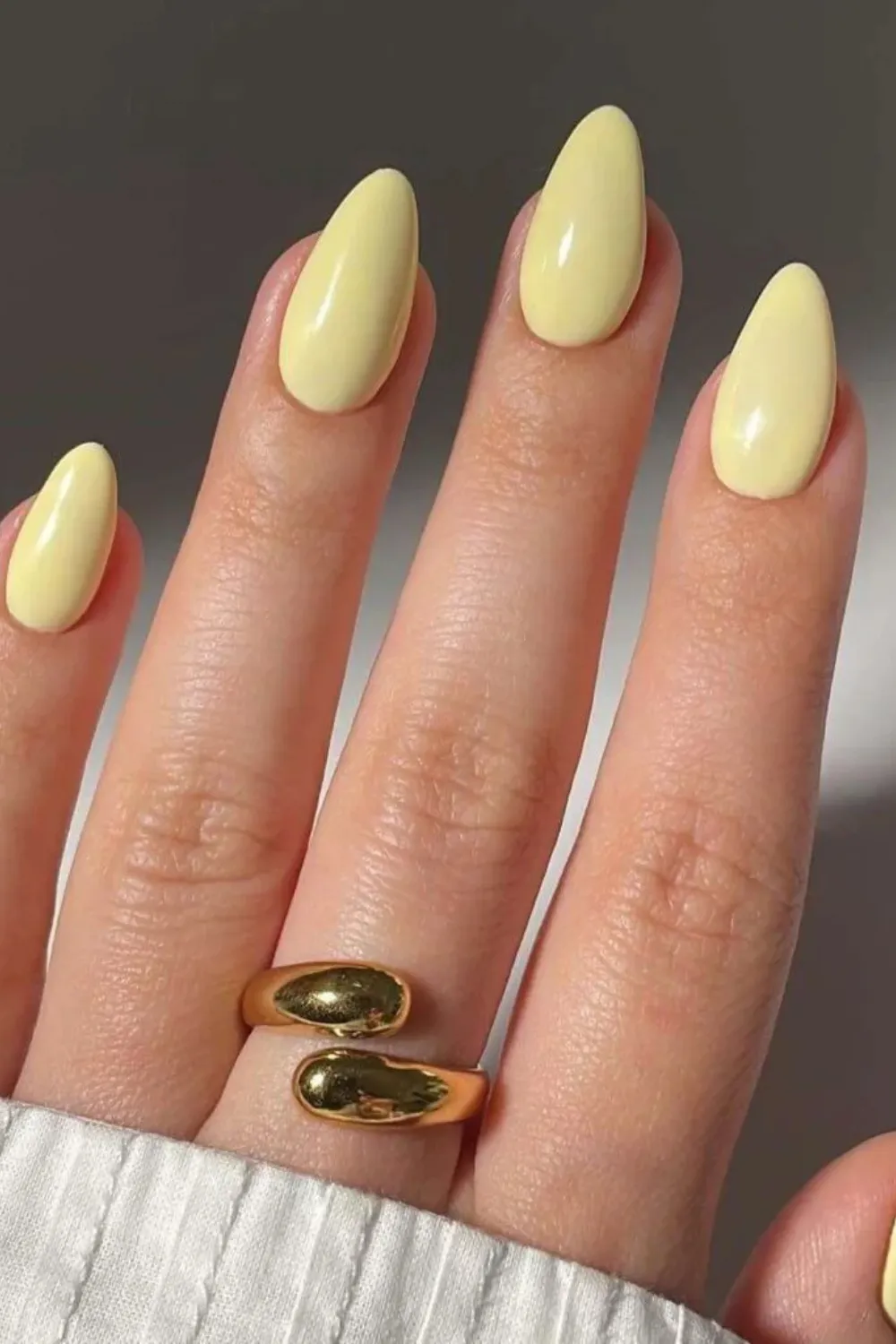 "Soft Yellow Juicy Pastel Nails Close-Up" – A sunny butter yellow pastel manicure