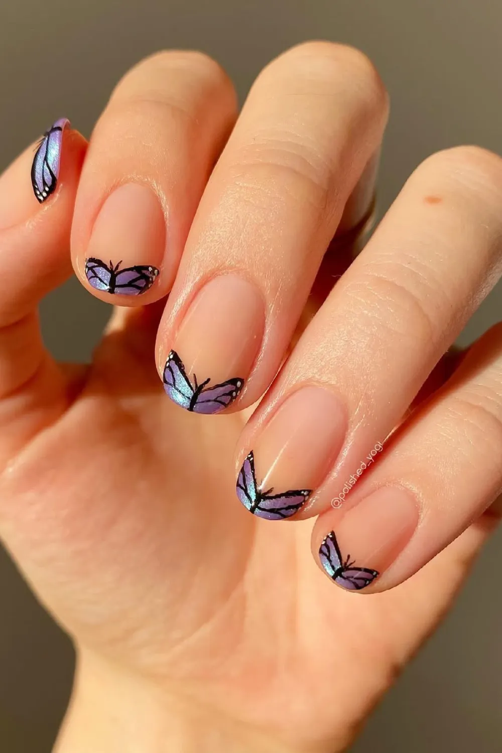 Butterfly French Tip Nails - Classic French manicure with tiny butterfly accents on each nail.