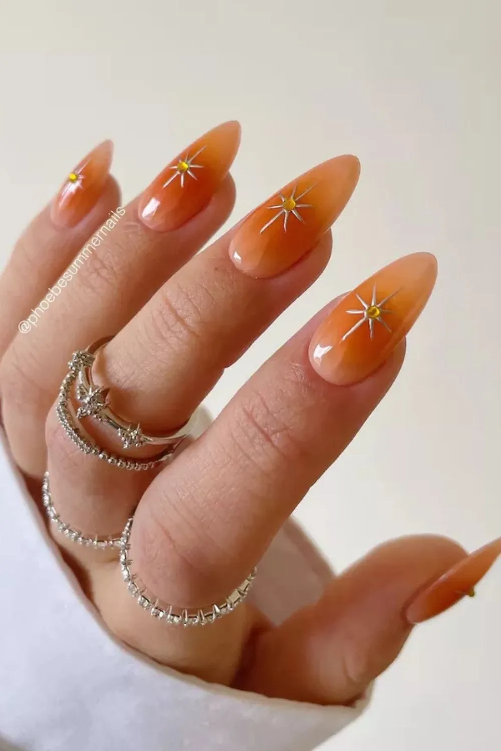 Starburst Peach Nails – Celestial-Inspired Nail Design With Star Accents on Peach Base