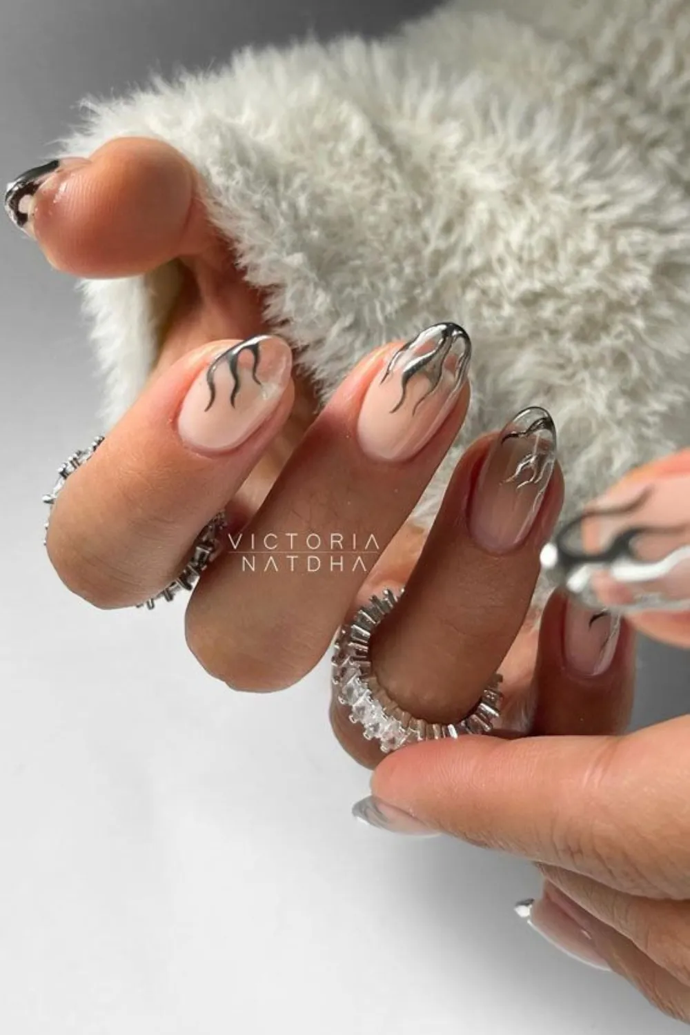 Chrome Nail Accents 2025 - Silver chrome nail accents adding futuristic edge to 2025 manicures