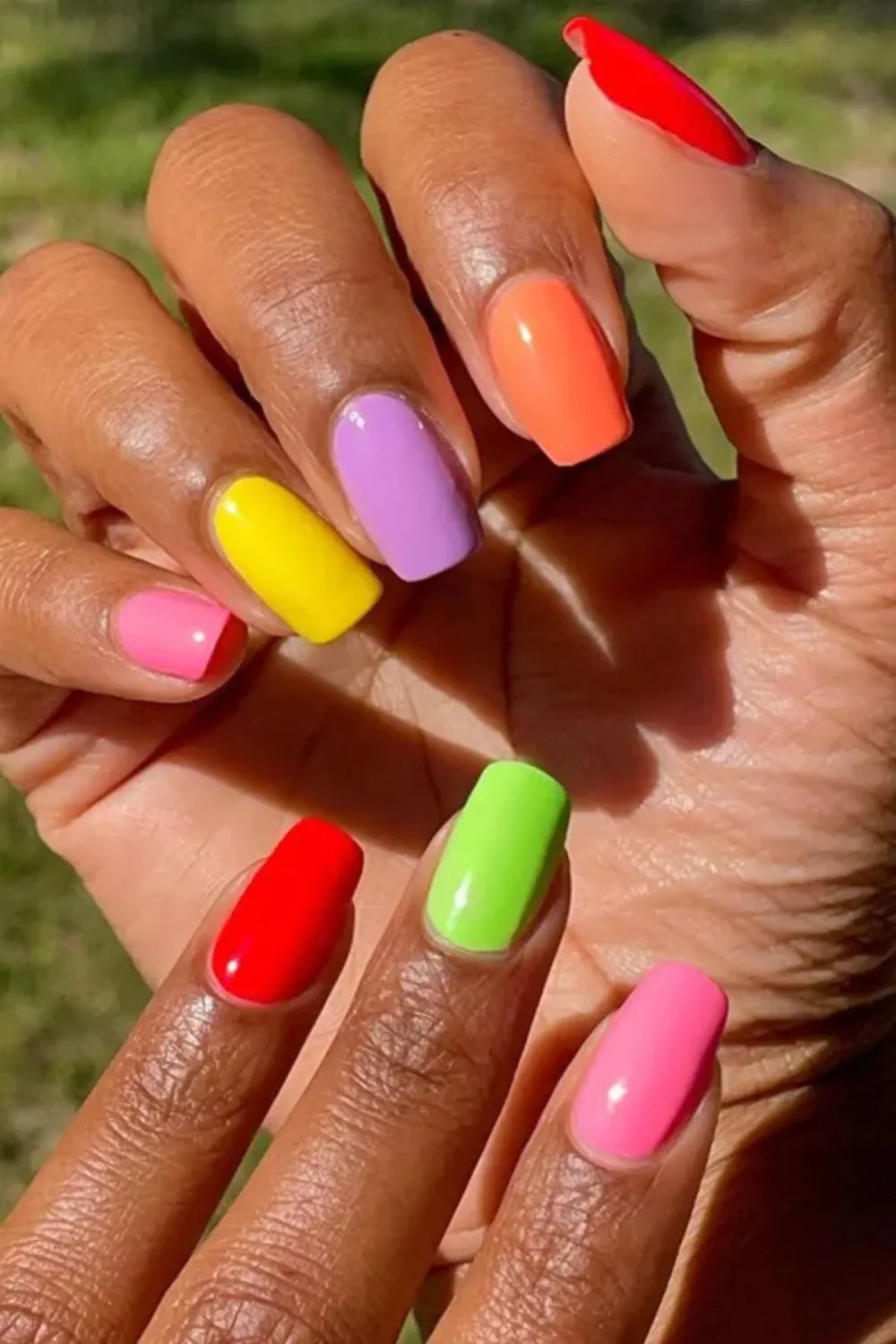 "Bright Rainbow Nails on Melanin Skin - Multicolor Summer Nail Inspiration"