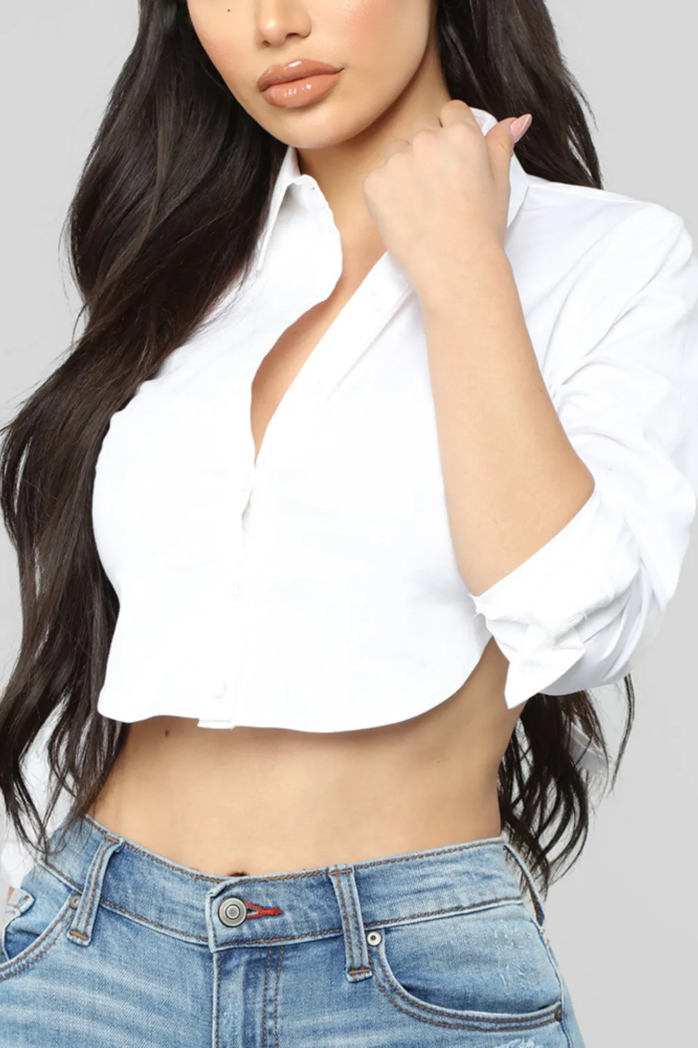 Cropped White Shirt with Denim 2025 - Woman wearing a cropped white shirt paired with denim jeans