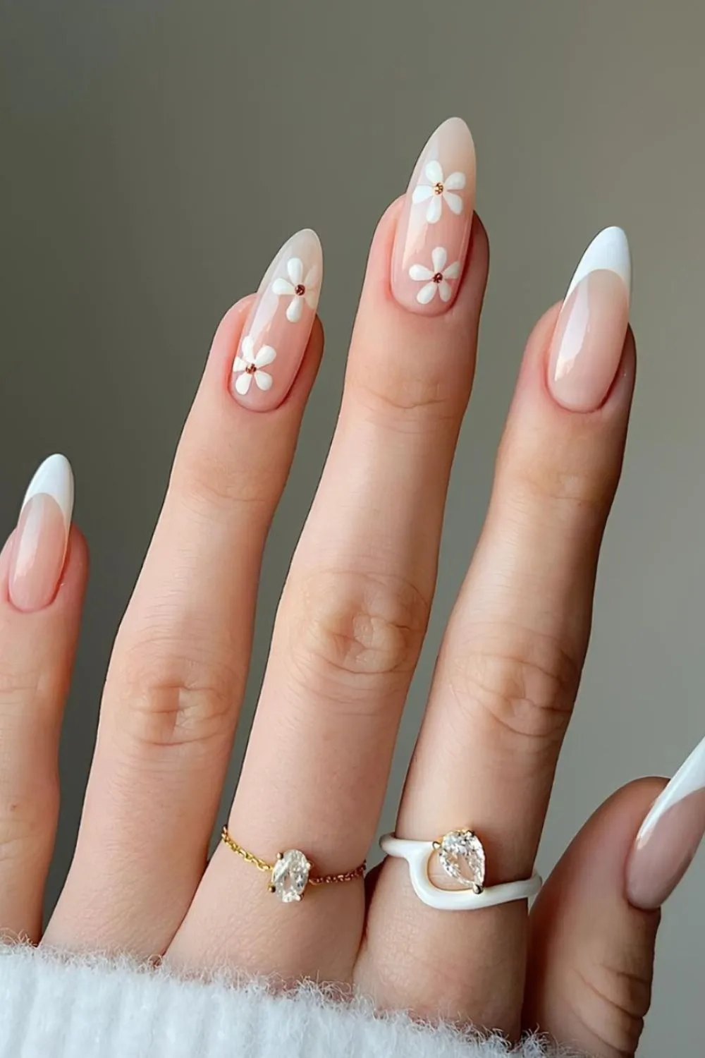 Daisy French Tip Nails - Long almond nails with white French tips and hand-painted white daisies.