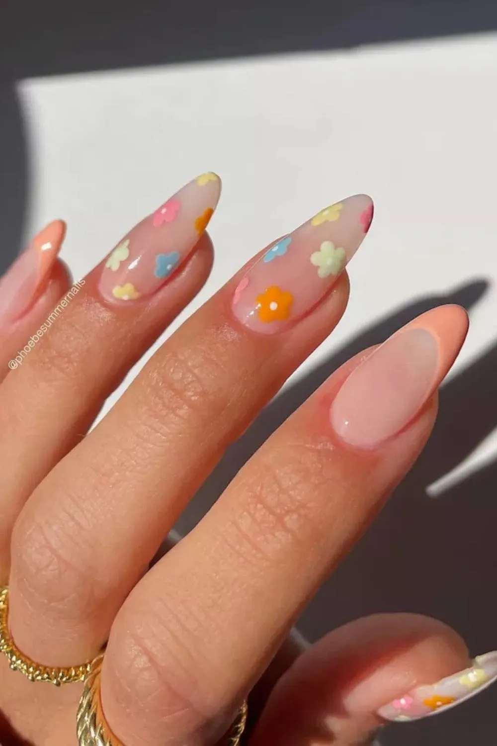 Floral Peach Nails – Pastel Flower Designs on a Soft Peach Sheer Base