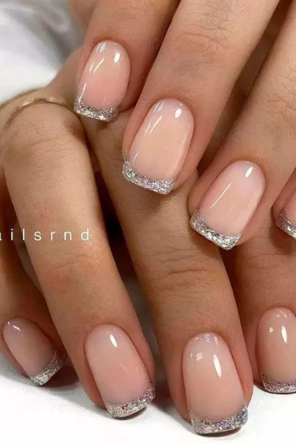 Glitter French Tips – Modern glitter twist on classic French nails.