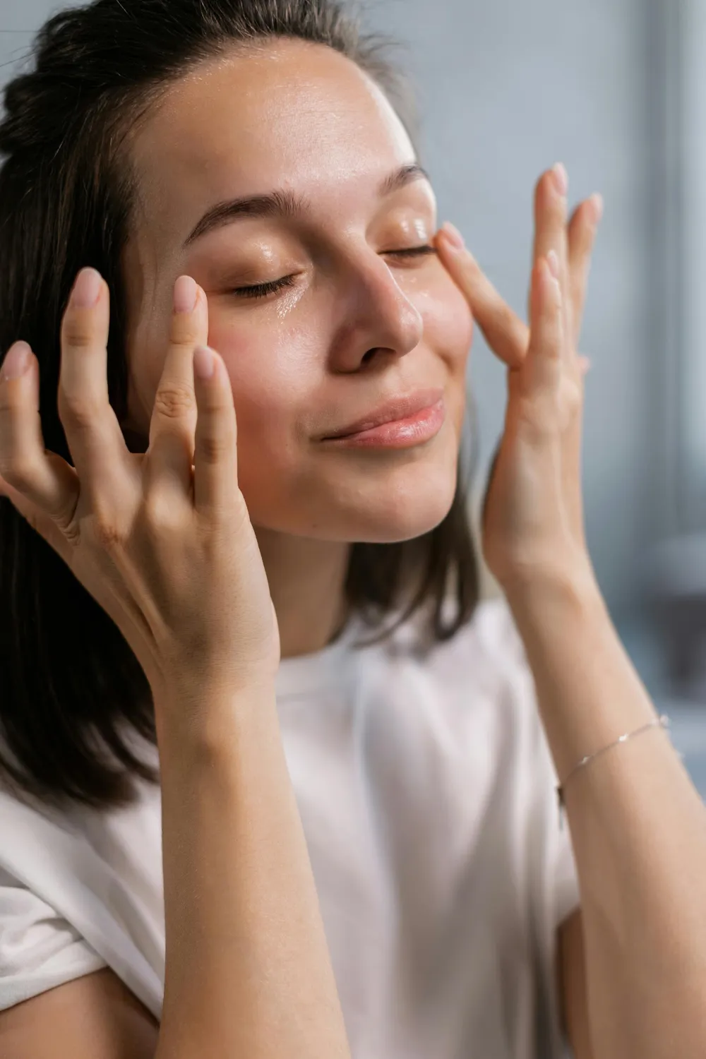 Glowing Skin Natural Makeup Look - Woman showcasing radiant, glowing skin with natural makeup
