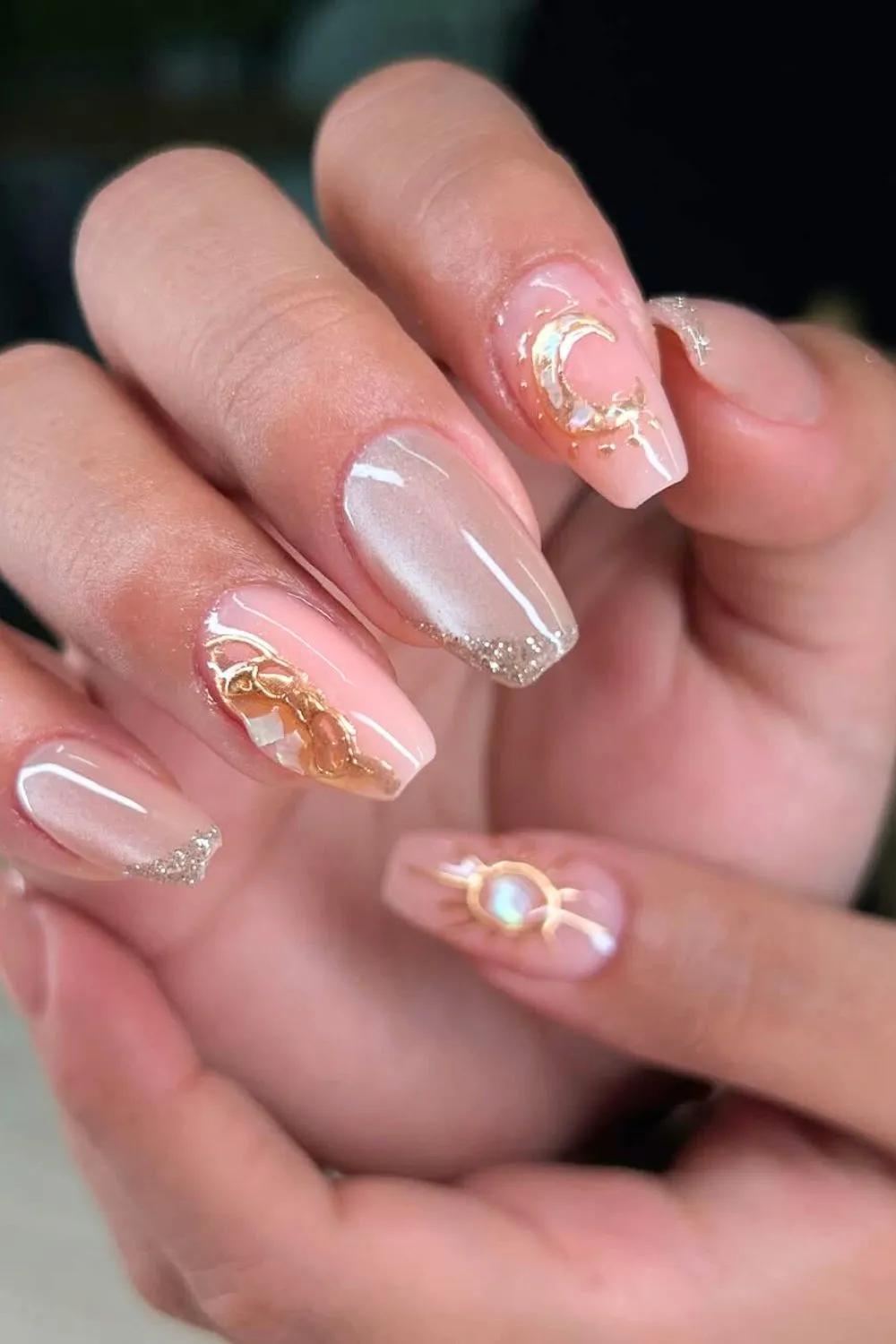 Nude Nails with Golden Crescent Moons - Long nude nails with gold foil moons and celestial accents