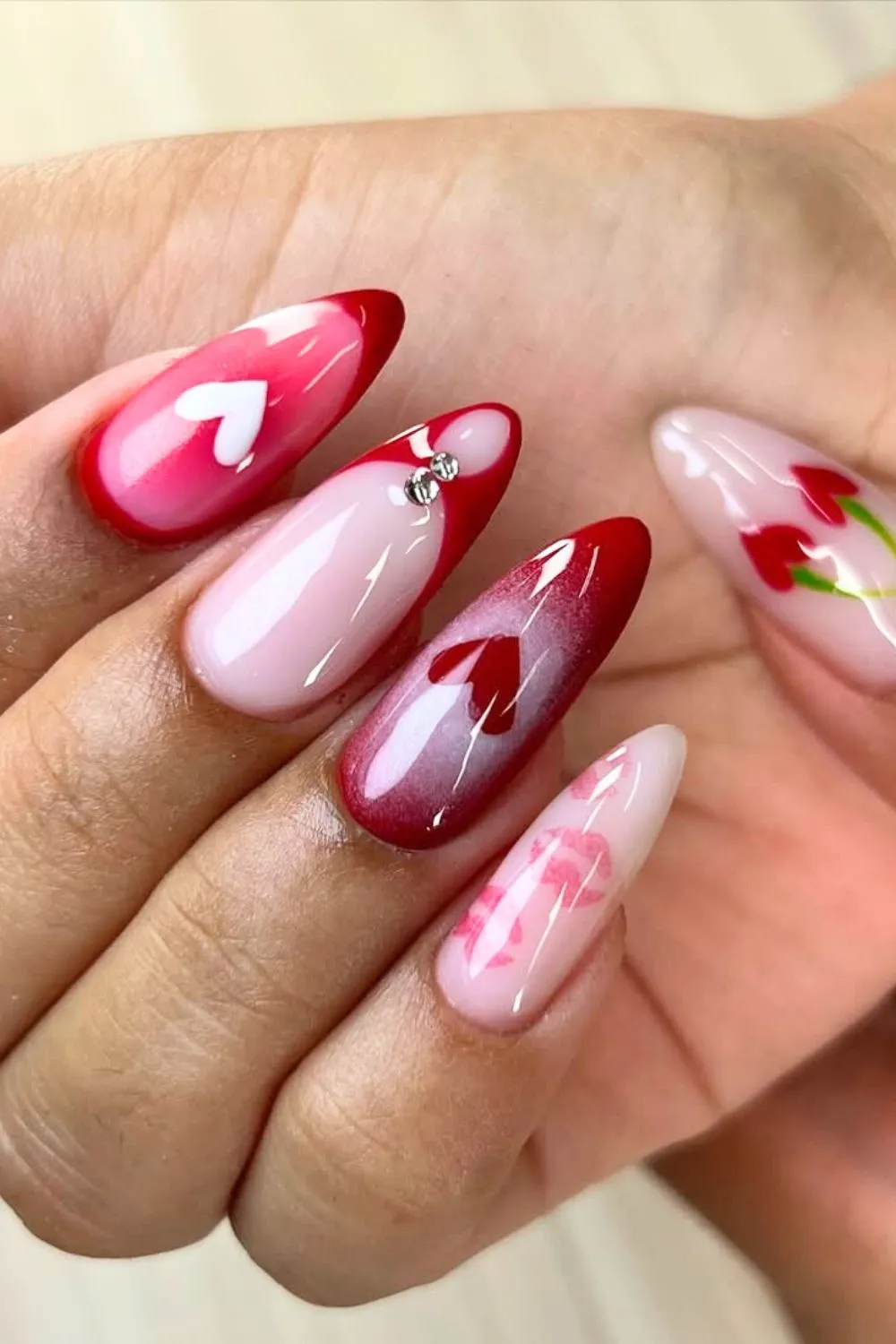 Love-Themed Nail Art - Romantic pink and red nails with heart and kiss illustrations