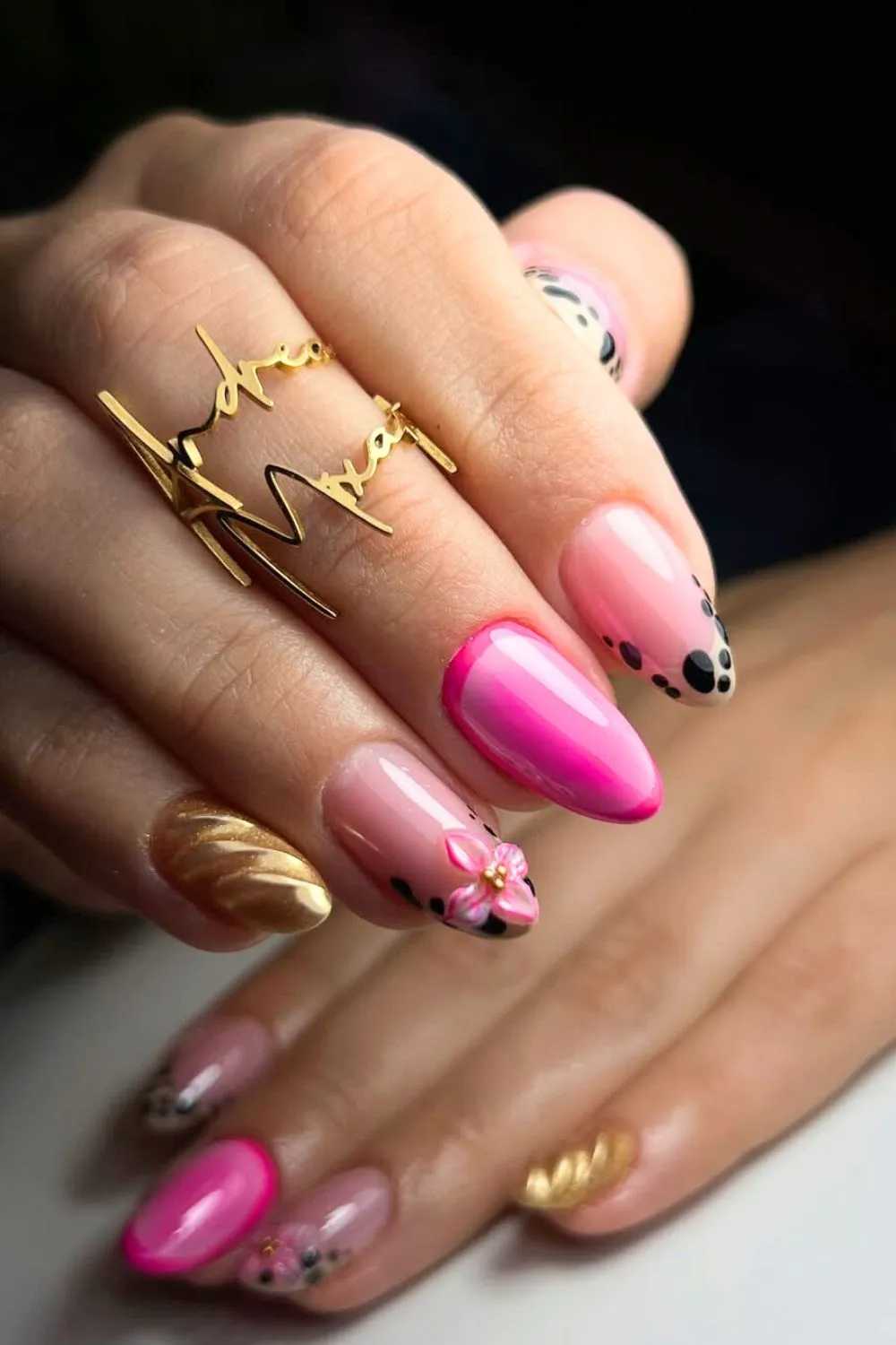 Hot Pink Animal Print Nail Design - Almond nails with hot pink polish, leopard accents, and gold flower detail