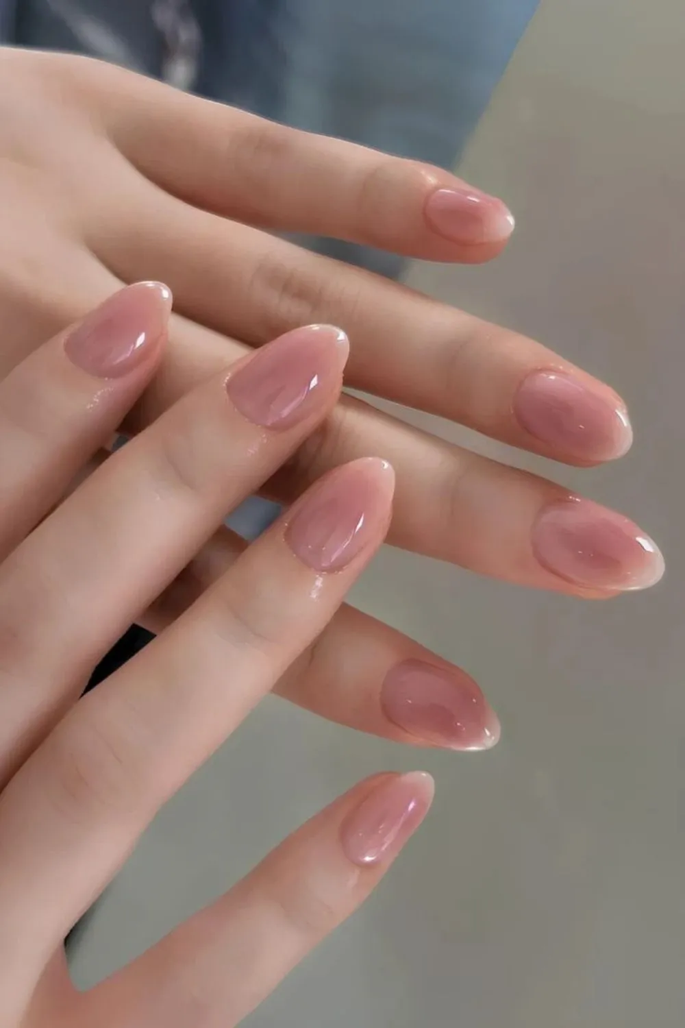 Mauve Aura Gloss Nails - Almond nails with sheer pink-mauve polish and high-gloss finish.