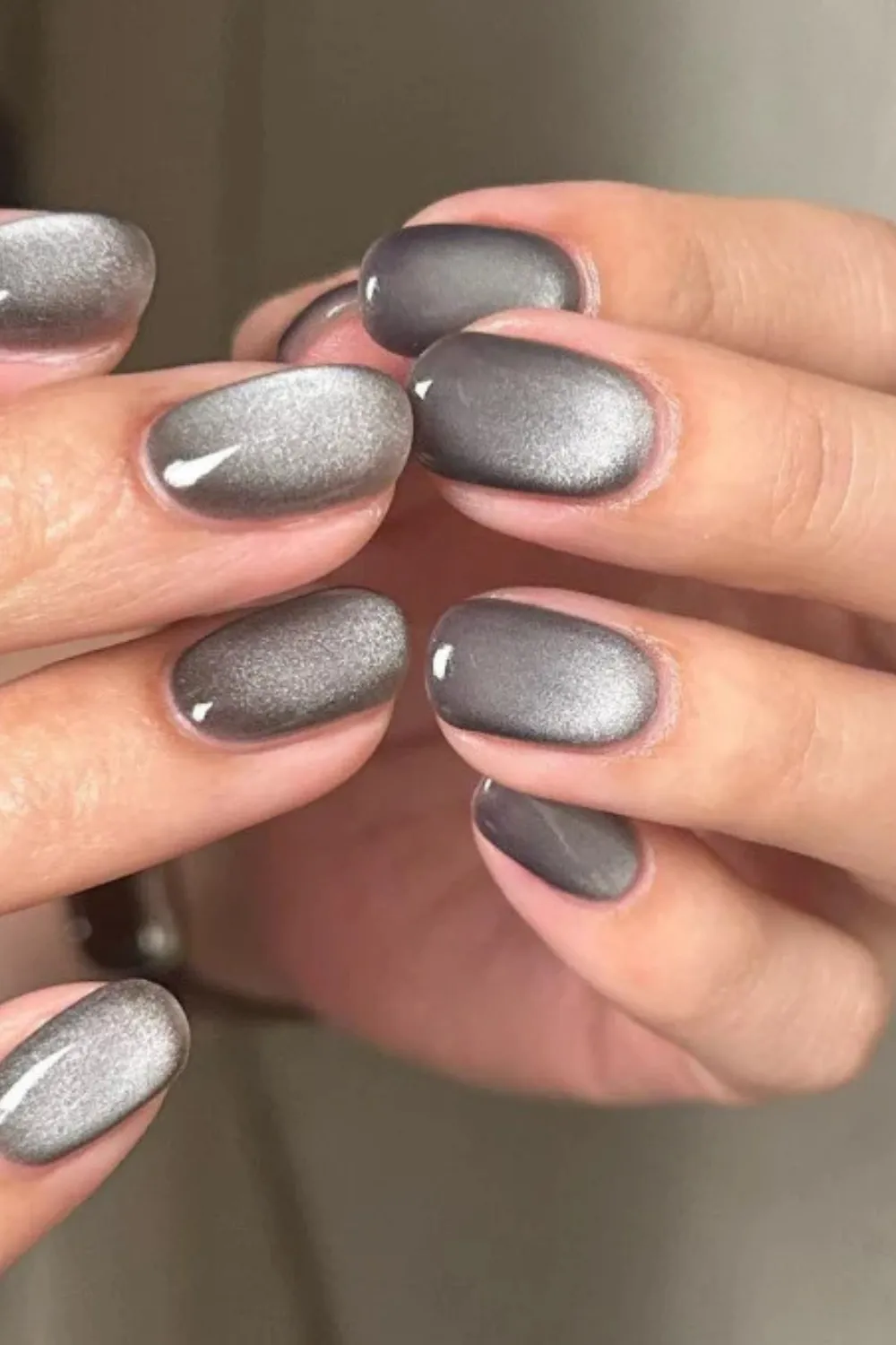 Metallic Silver Cat Eye Nails- Sleek metallic silver cat eye nails with a sharp magnetic shine for a futuristic spring aesthetic.