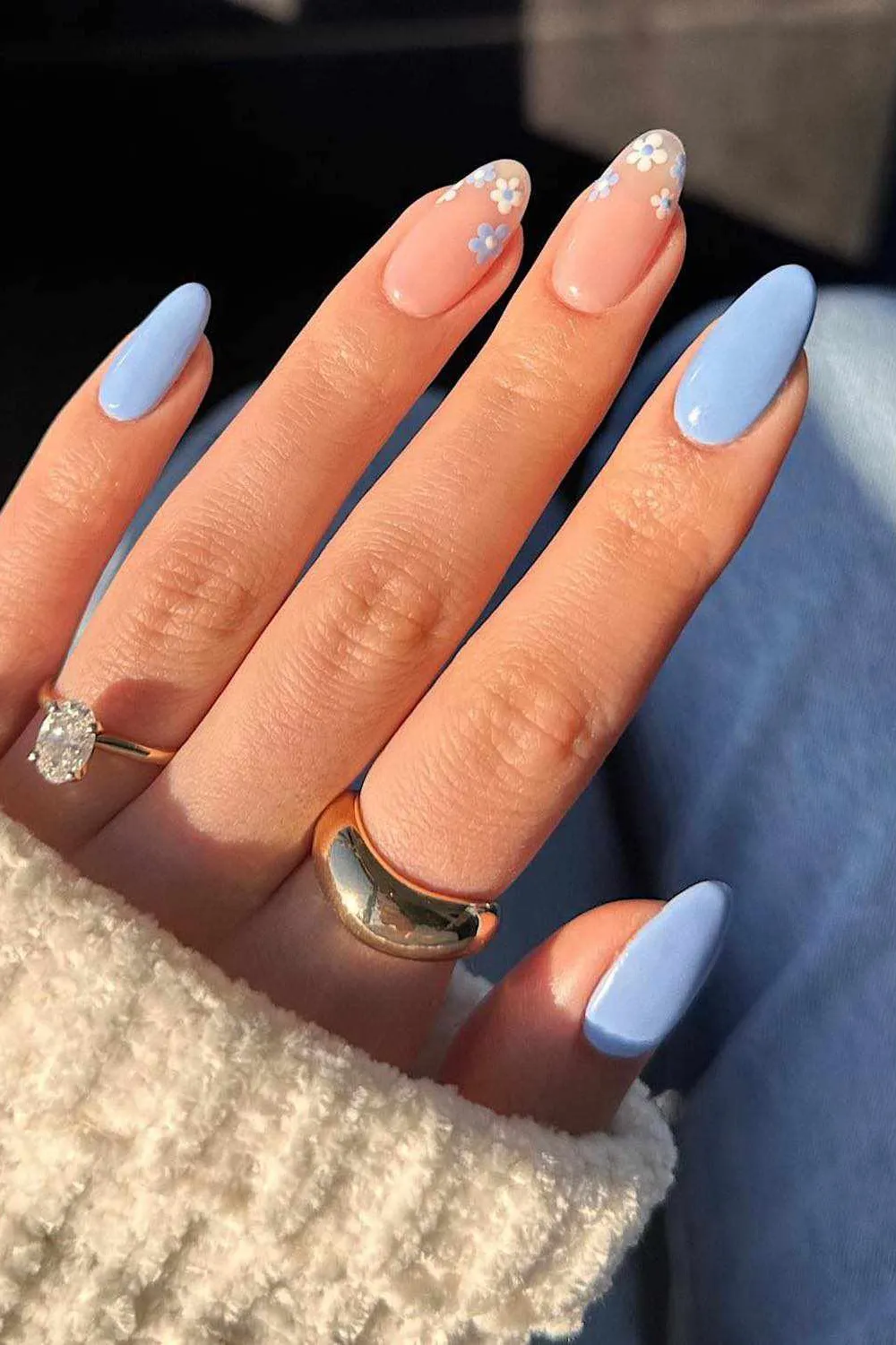 Pastel Floral Tips – Soft floral accents on French tips.