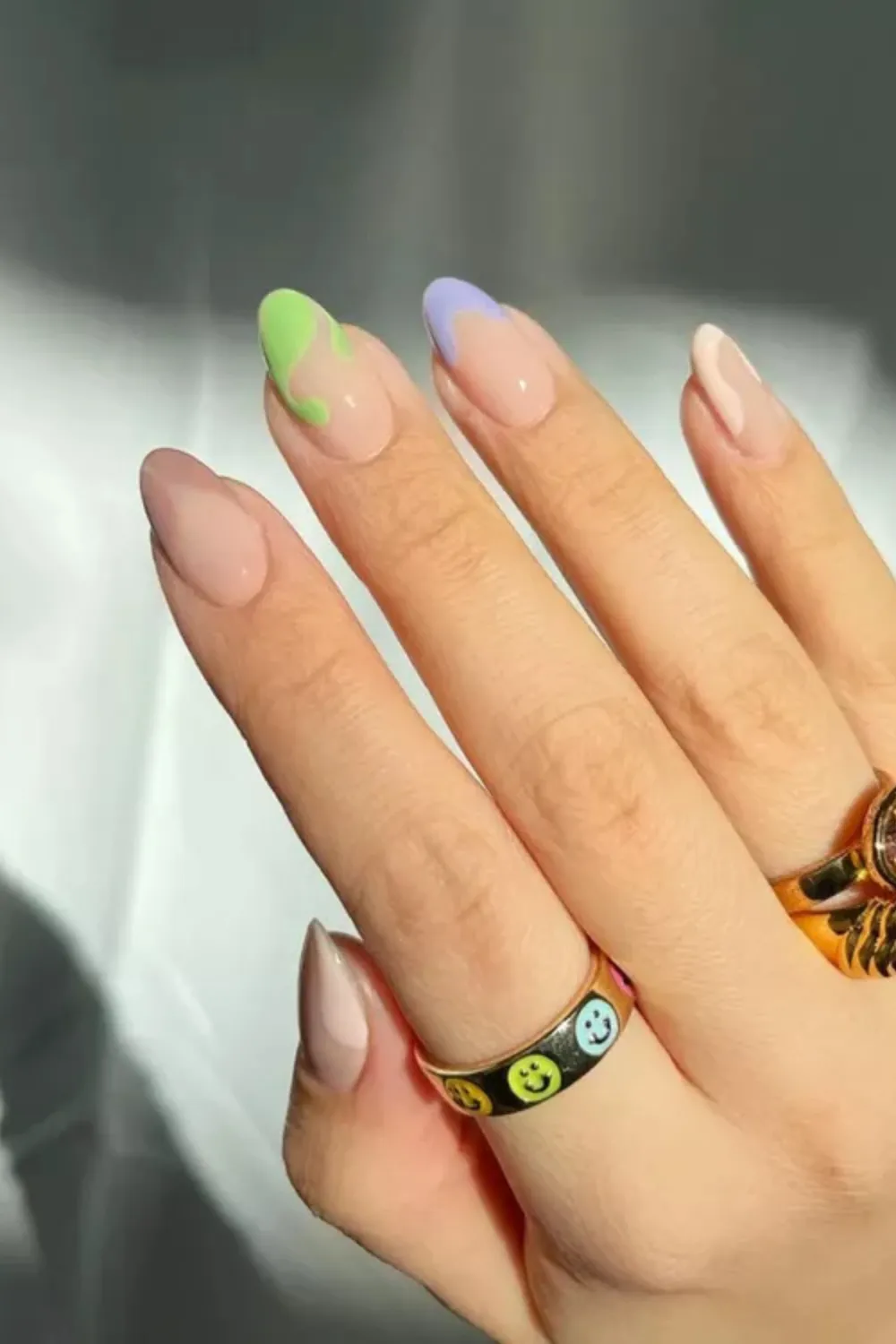 Pastel Abstract Art Spring Nail Design - Nude nails with pastel drips and abstract spring designs
