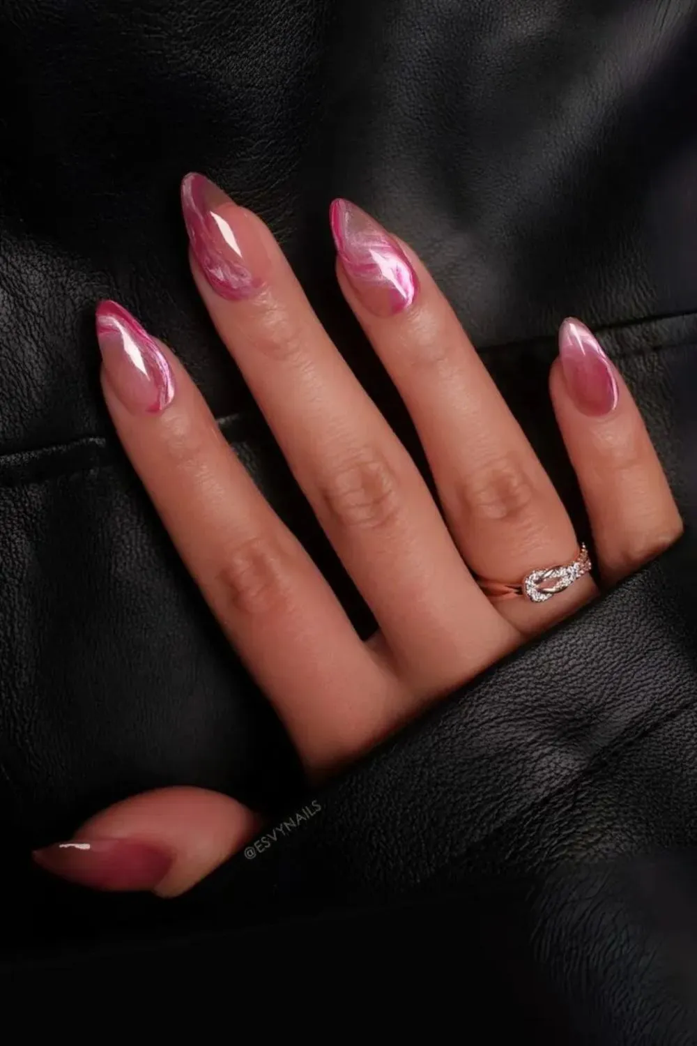 Pink Cat Eye Marble Nails - Shiny almond nails with pink cat-eye and marble effect.