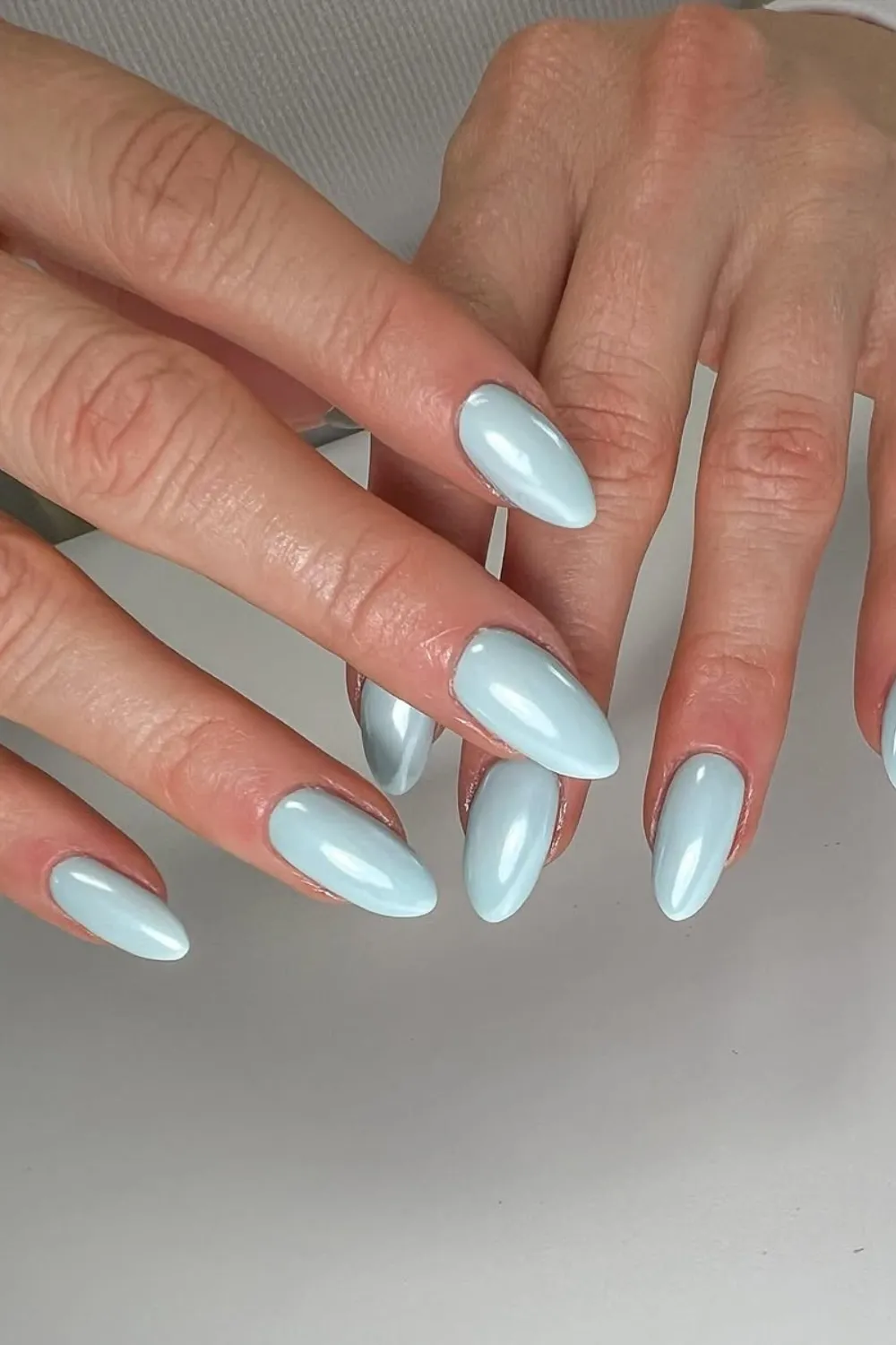 Powder Blue Chrome Nails - Reflective powder blue chrome manicure for a sleek look.