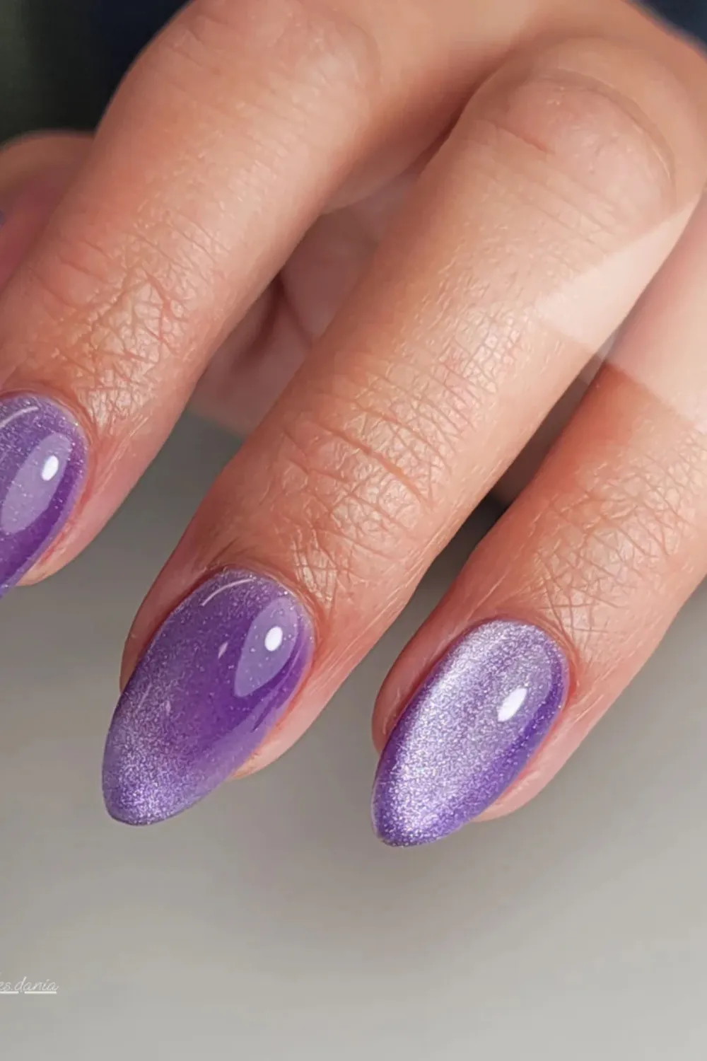 Purple Haze Cat Eye Nails-Hypnotic purple cat eye nails with a dynamic magnetic effect for a bold spring statement.