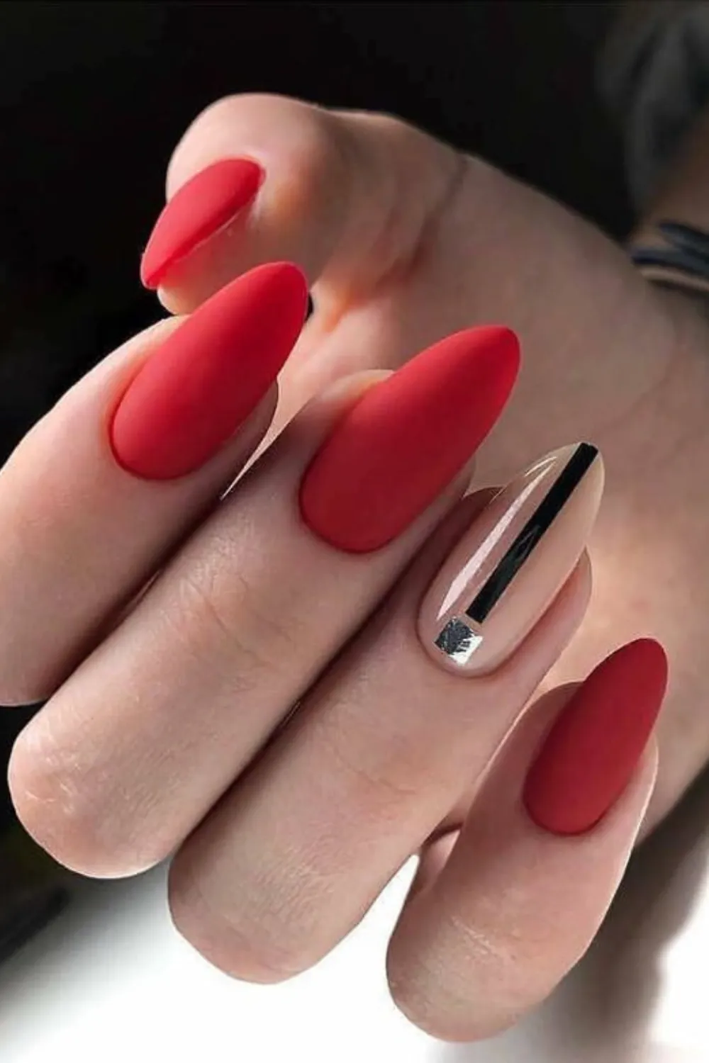 Red Hot Almond Nails 2025 - Bold red polish on almond shaped nails 2025