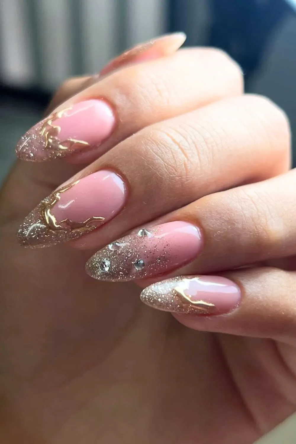 Rose Gold and Glitter Almond Nails - Almond-shaped pink nails with gold foil accents and silver glitter tips