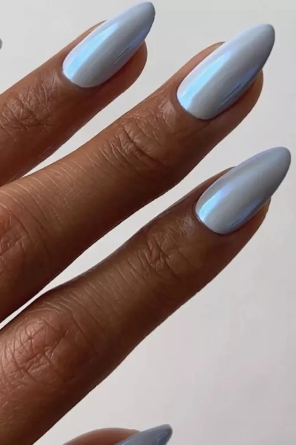 Chrome Sky Blue Nails - Shiny chrome sky blue nails for a futuristic look.