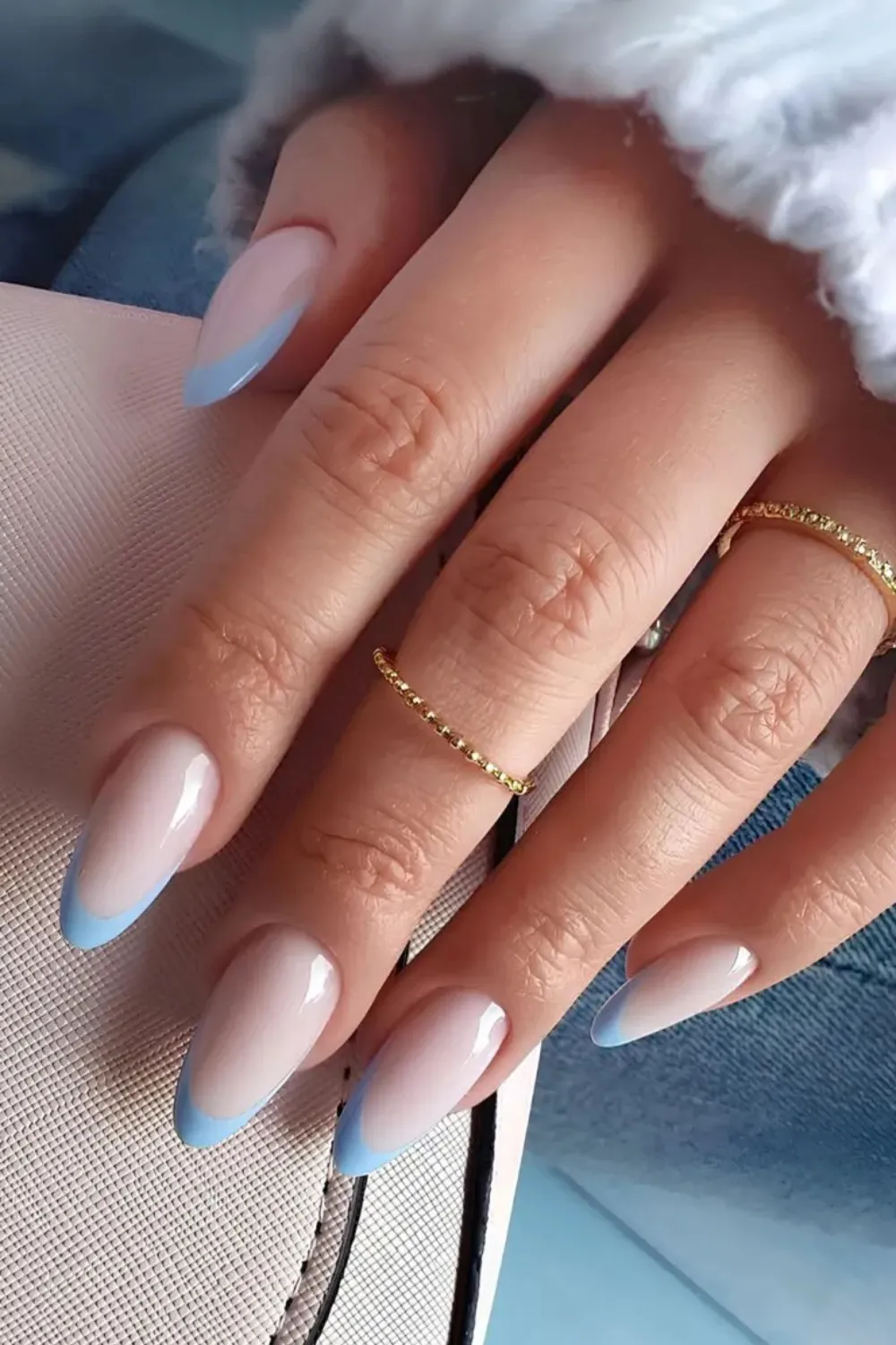 Sky Blue French Tip Nails - French manicure with vibrant sky blue tips.
