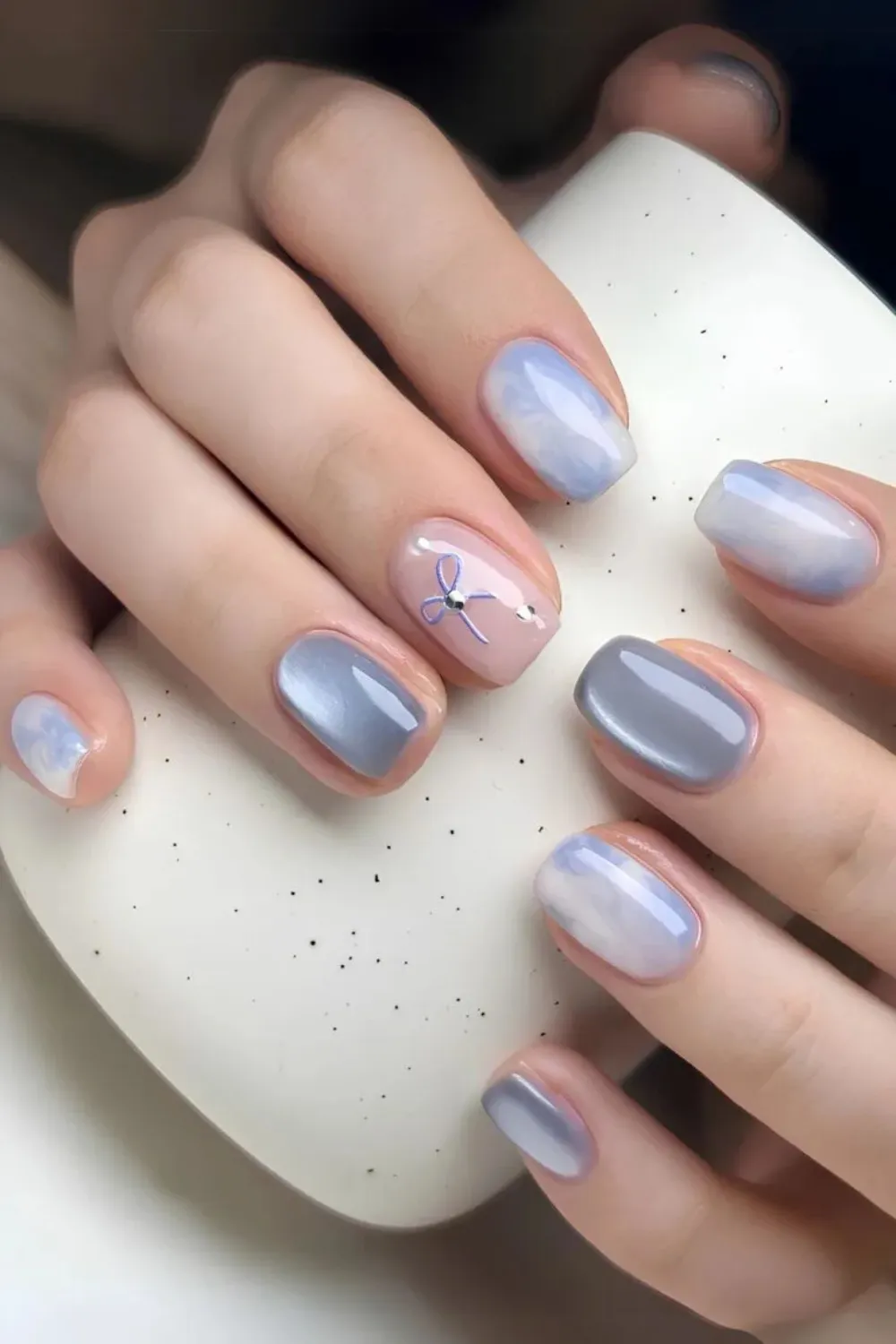 Sky Blue Marble Nails - Elegant marble sky blue nail art design.