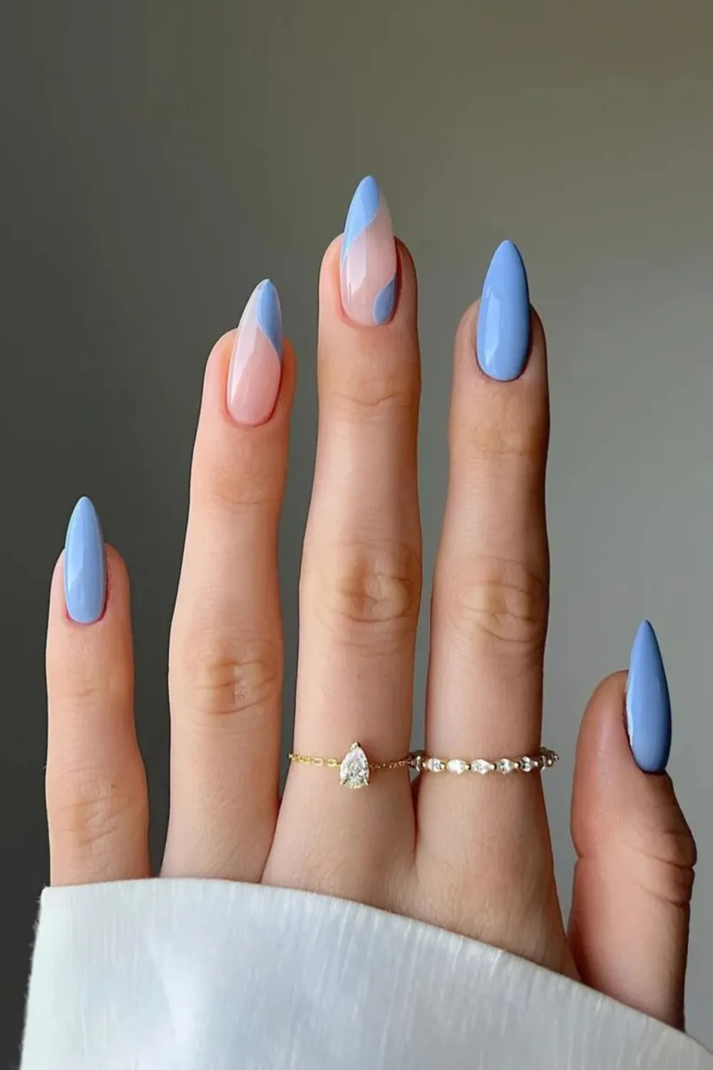Sky Blue Negative Space Nails - Nails with sky blue designs and negative space details.