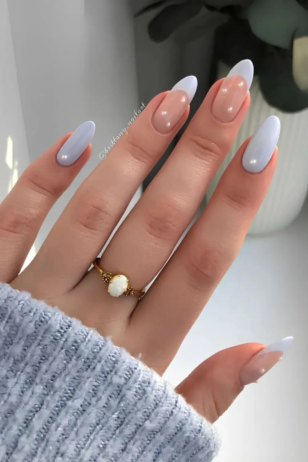 Sky Blue Pearl Nails - Elegant sky blue nails with pearl decorations.