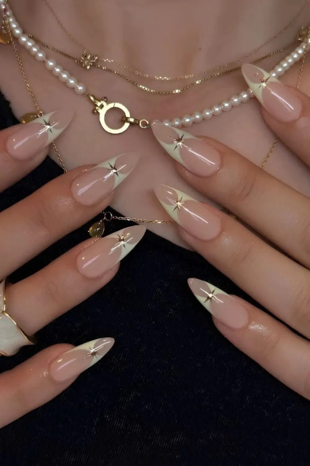 Starry Almond Nails – Nude Almond Nails With Gold Star Accents