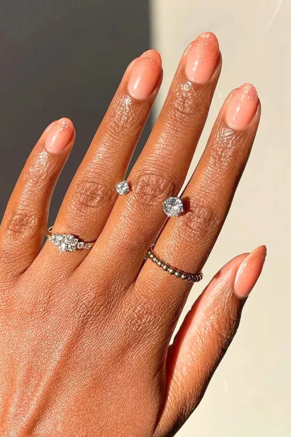 Sparkly Peach Nails – Sheer Peach Polish With Glitter Accents for Subtle Shine