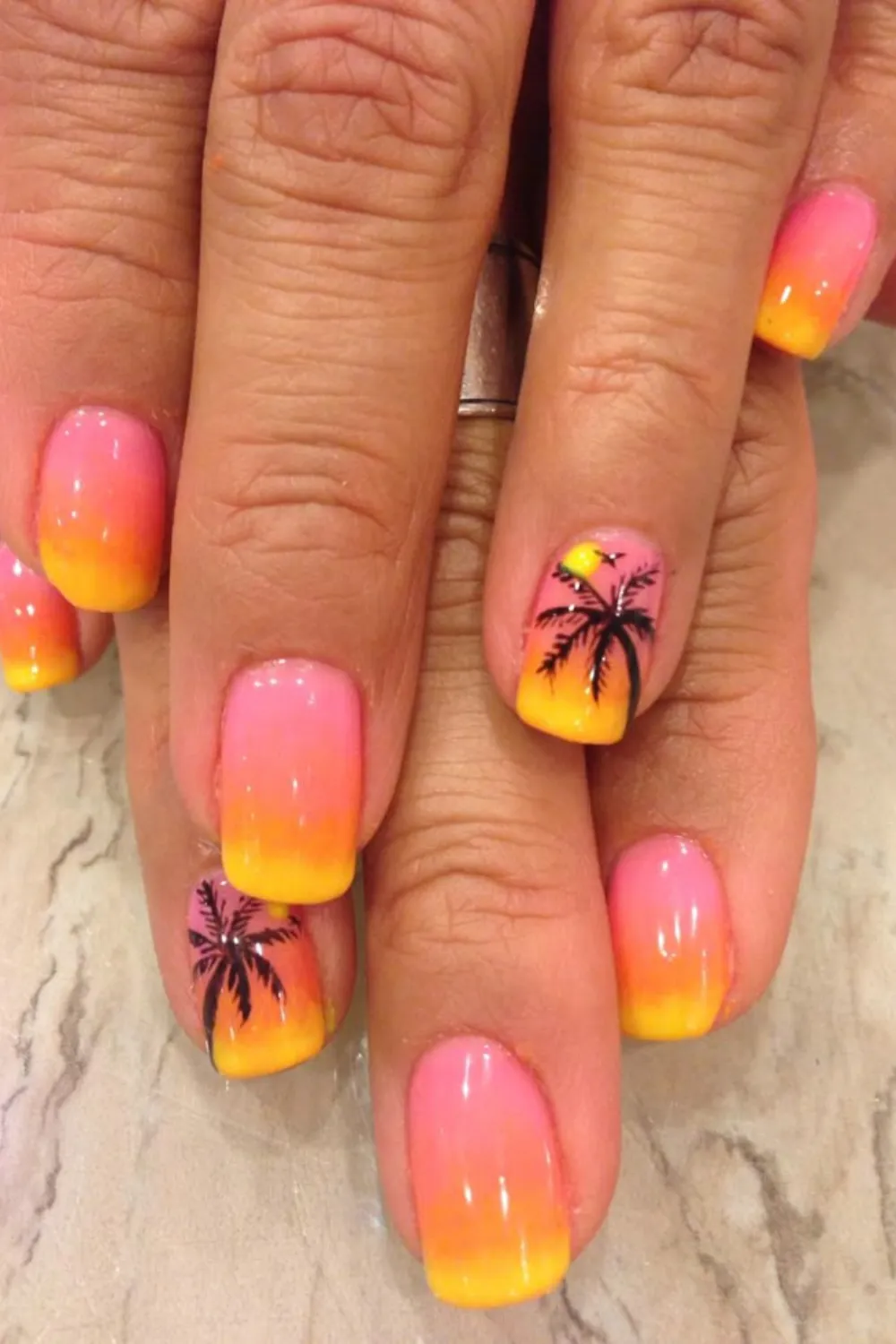 Sunset Glitter Glow Nails - Sparkly sunset gradient nails with glitter accents, perfect for spring evenings.