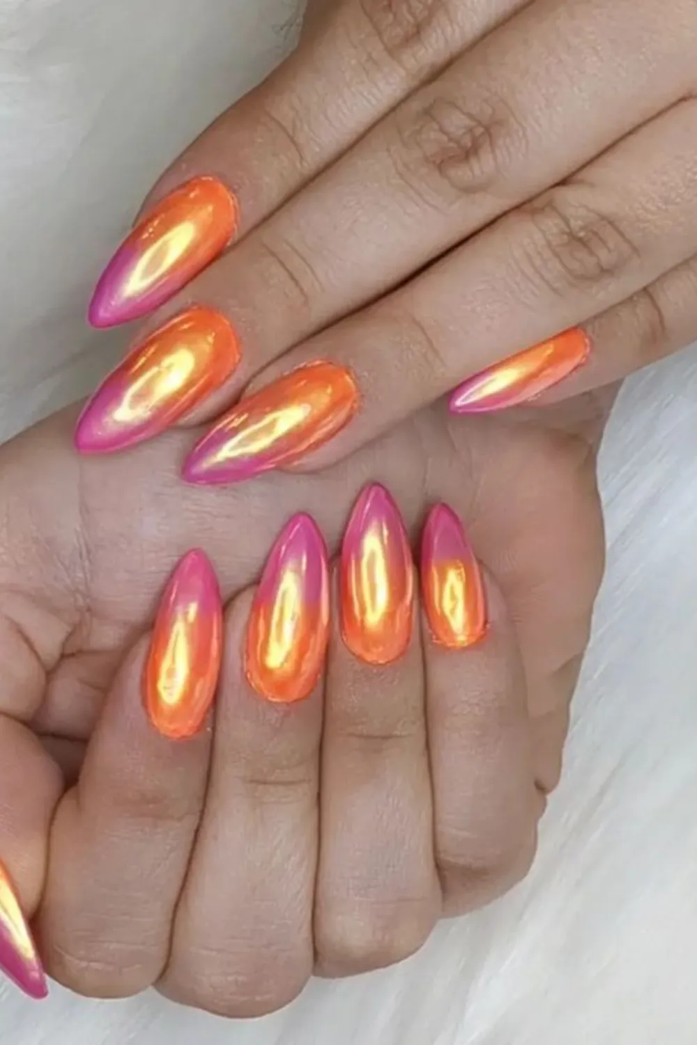 Sunset Ombre French Tips - French manicure with sunset gradient tips, blending coral and pink hues.