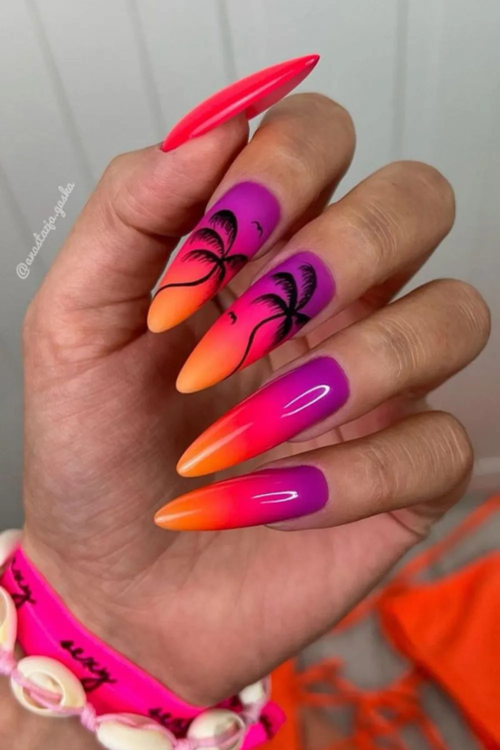 Sunset Swirl Delight Nails - Abstract swirls in pink, orange, and coral shades, creating a unique sunset-inspired look.