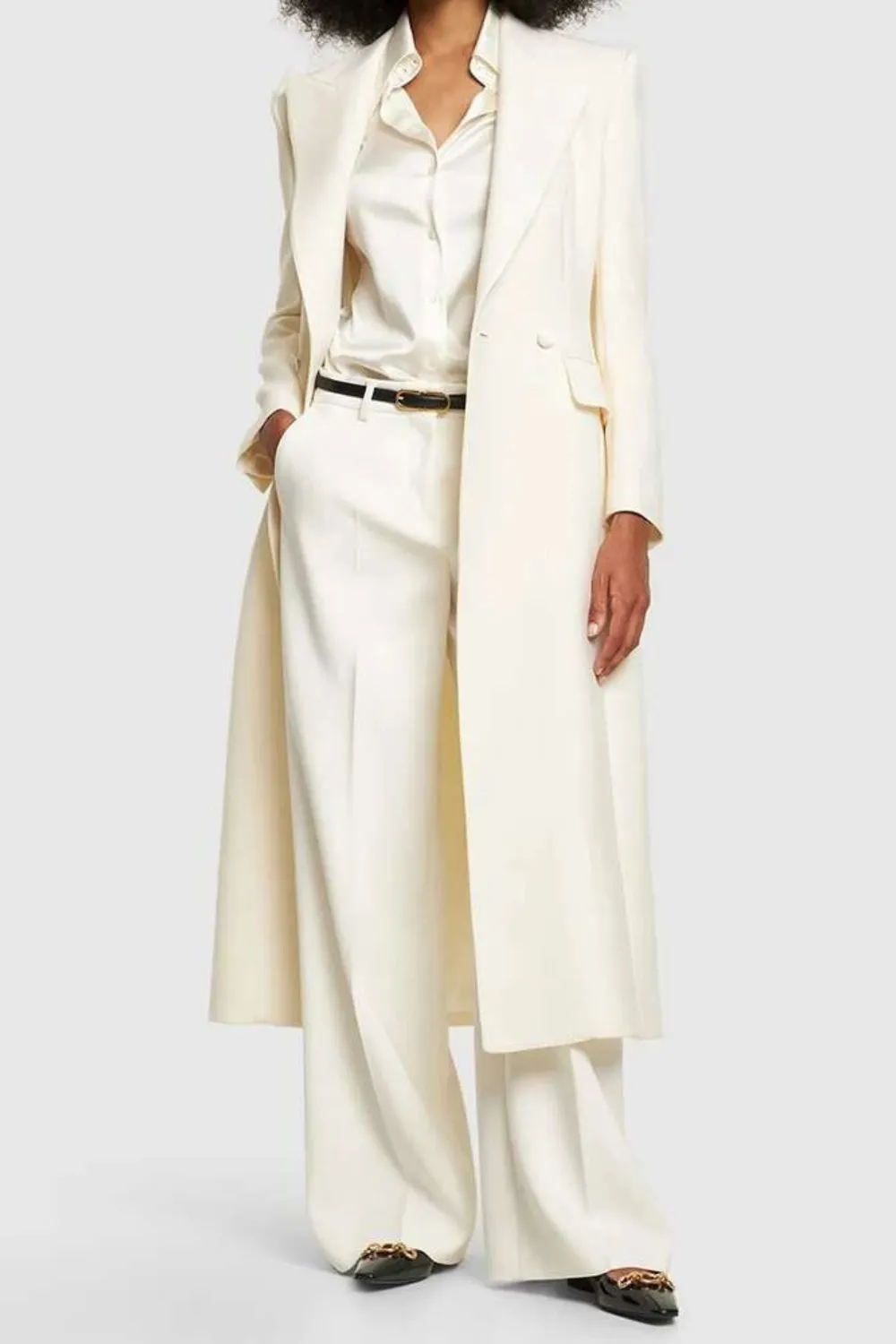 Tailored Cream Suit with Overcoat 2025 - Woman wearing an elegant cream suit with matching long overcoat