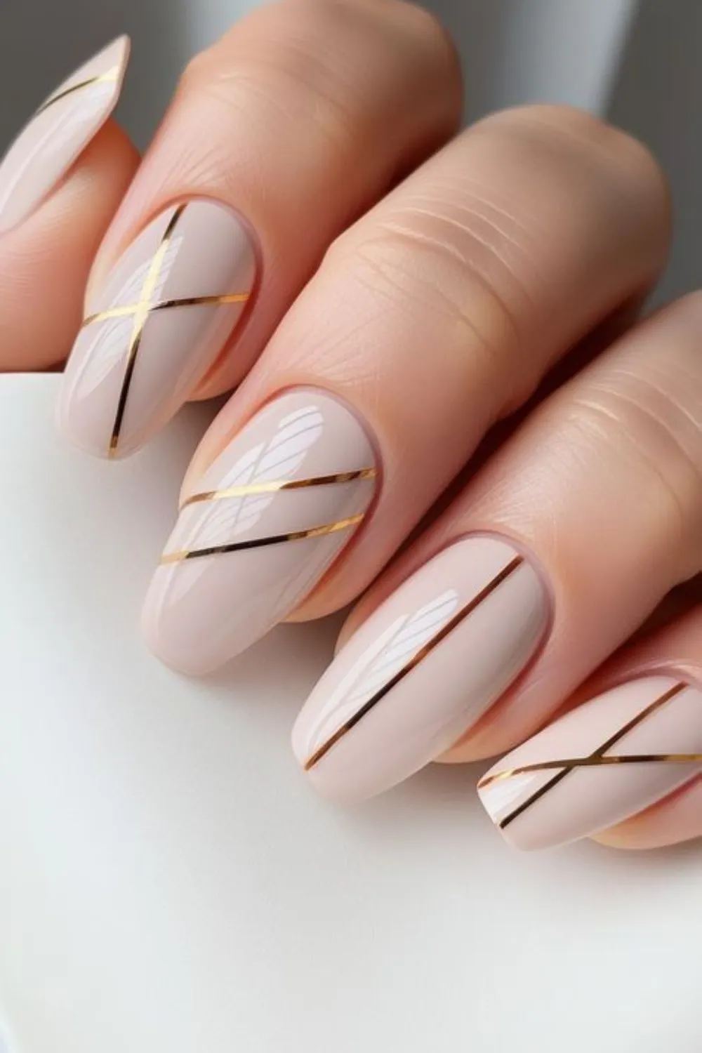 Gold Stripe Nail Design - Glamorous Minimalist Accent : Gold stripe nails showcasing modern and elegant designs.