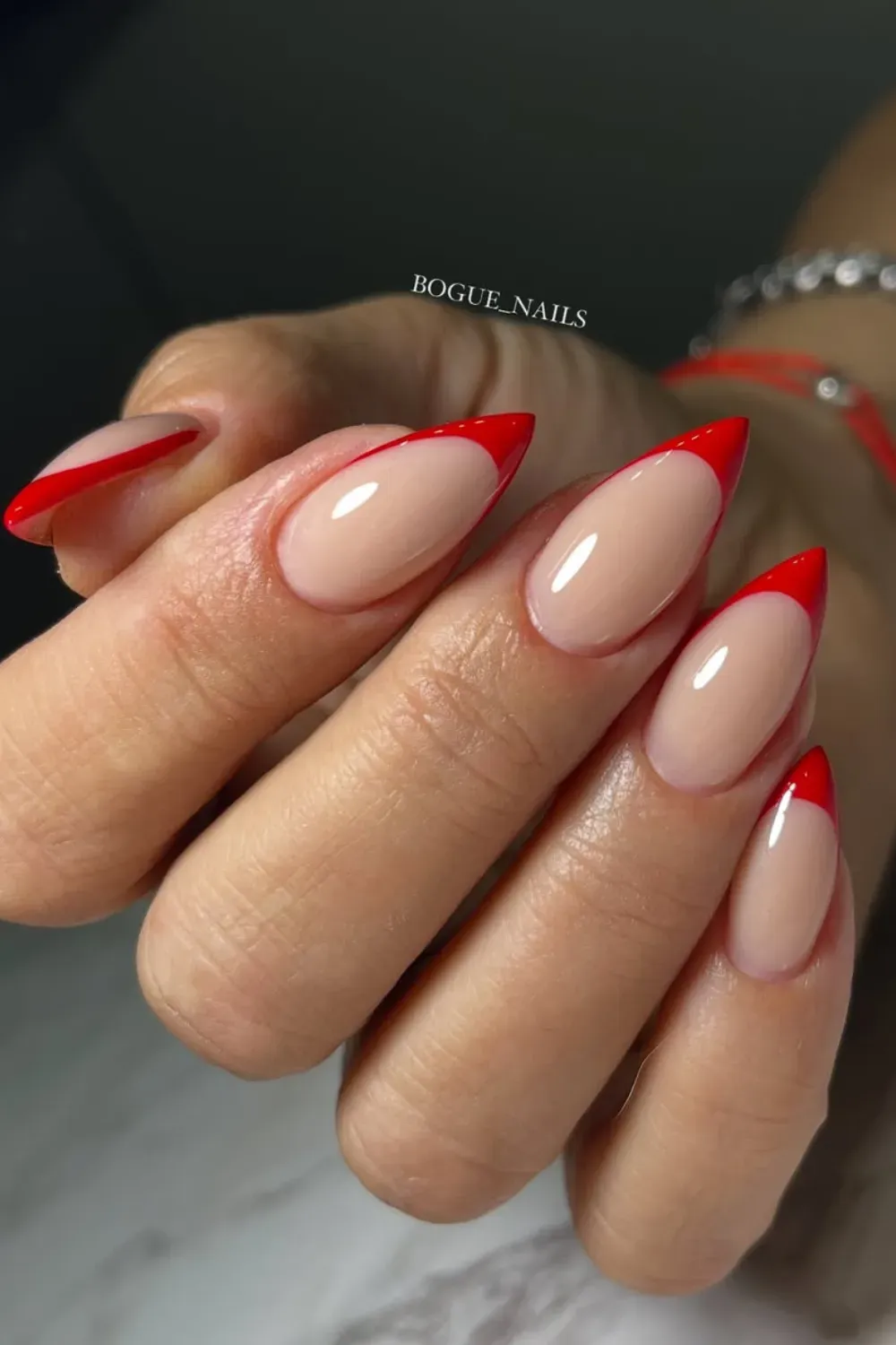 Classic red French tips on nude nails