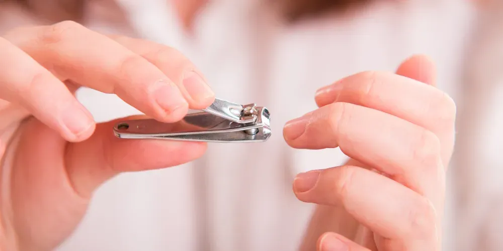 A person clipping nails