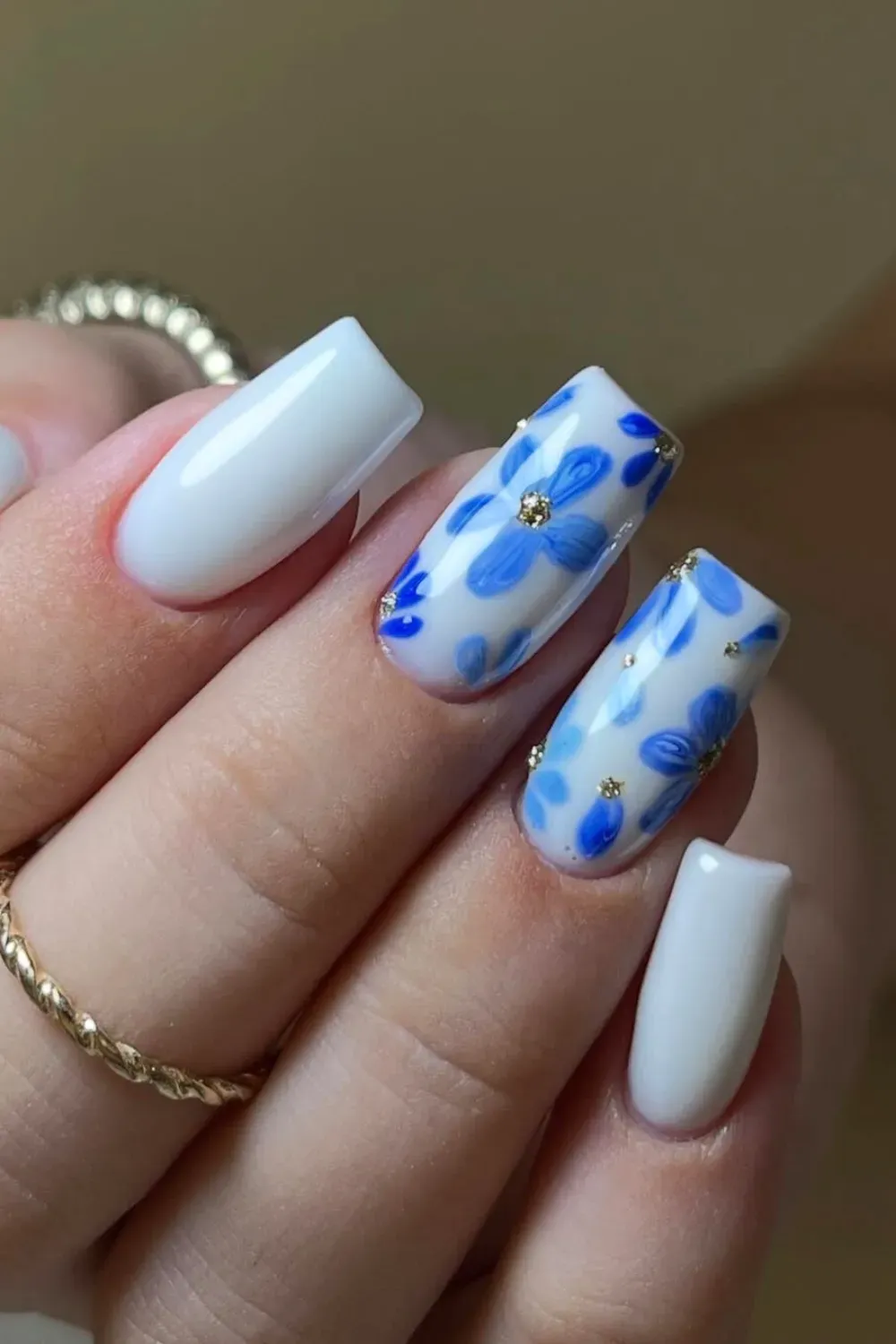 Blue Floral and Leaf Patterns - Intricate blue floral and leaf patterns with gold accents for a nature-inspired look