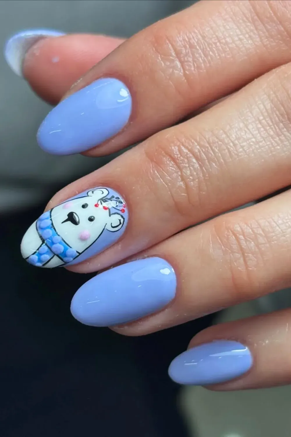 Light purple nails with a cute winter bear design for a whimsical back-to-school look