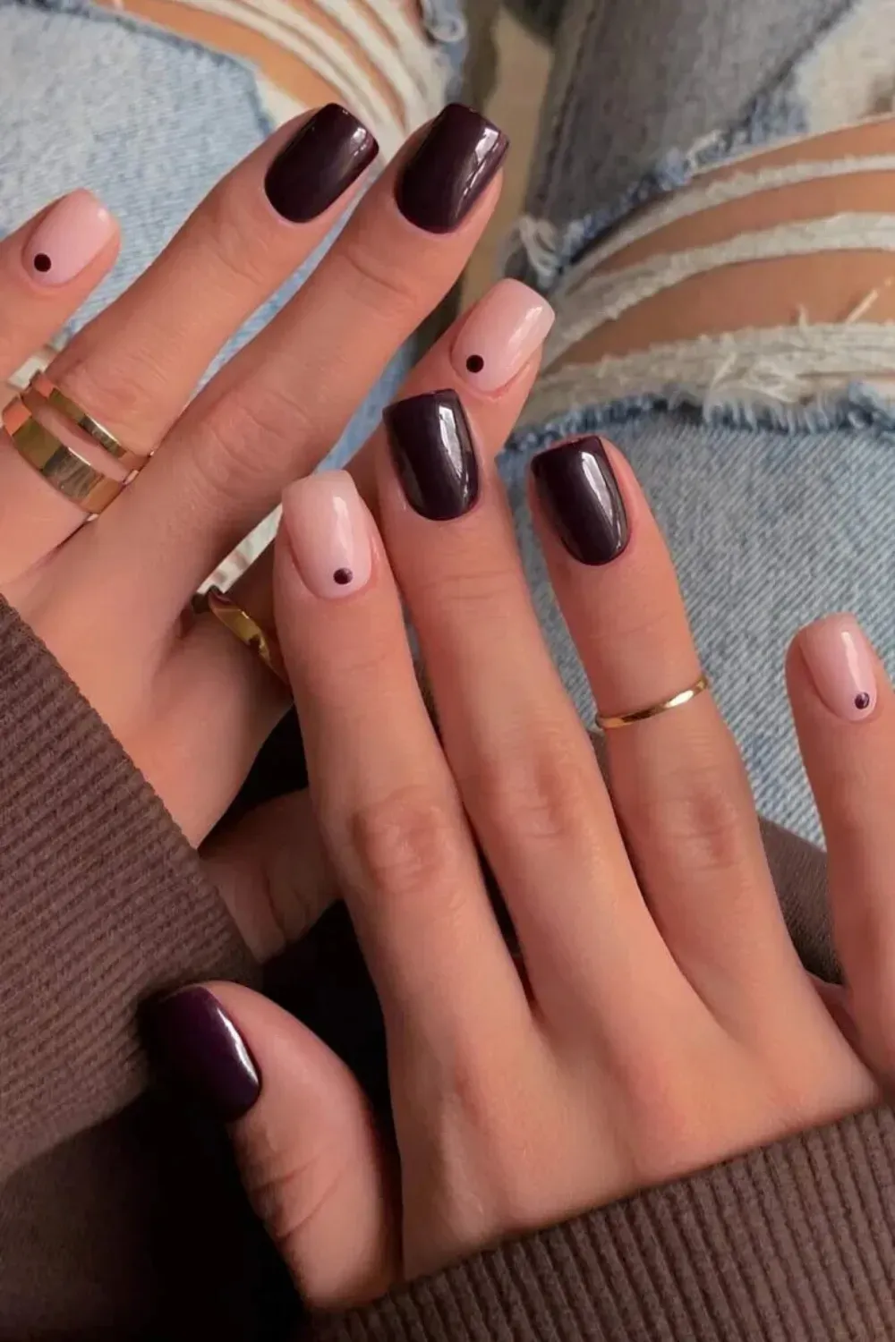 Minimal nude nails with small brown dot accents