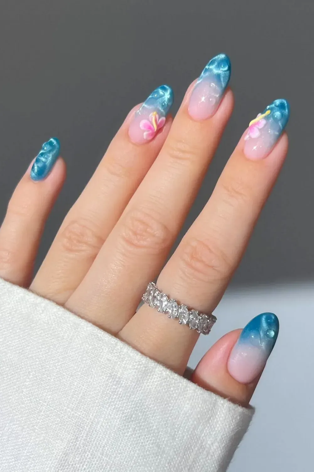 Floral Blue Nail Art with Velvet Texture - Velvet-textured floral blue nails with a touch of luxury
