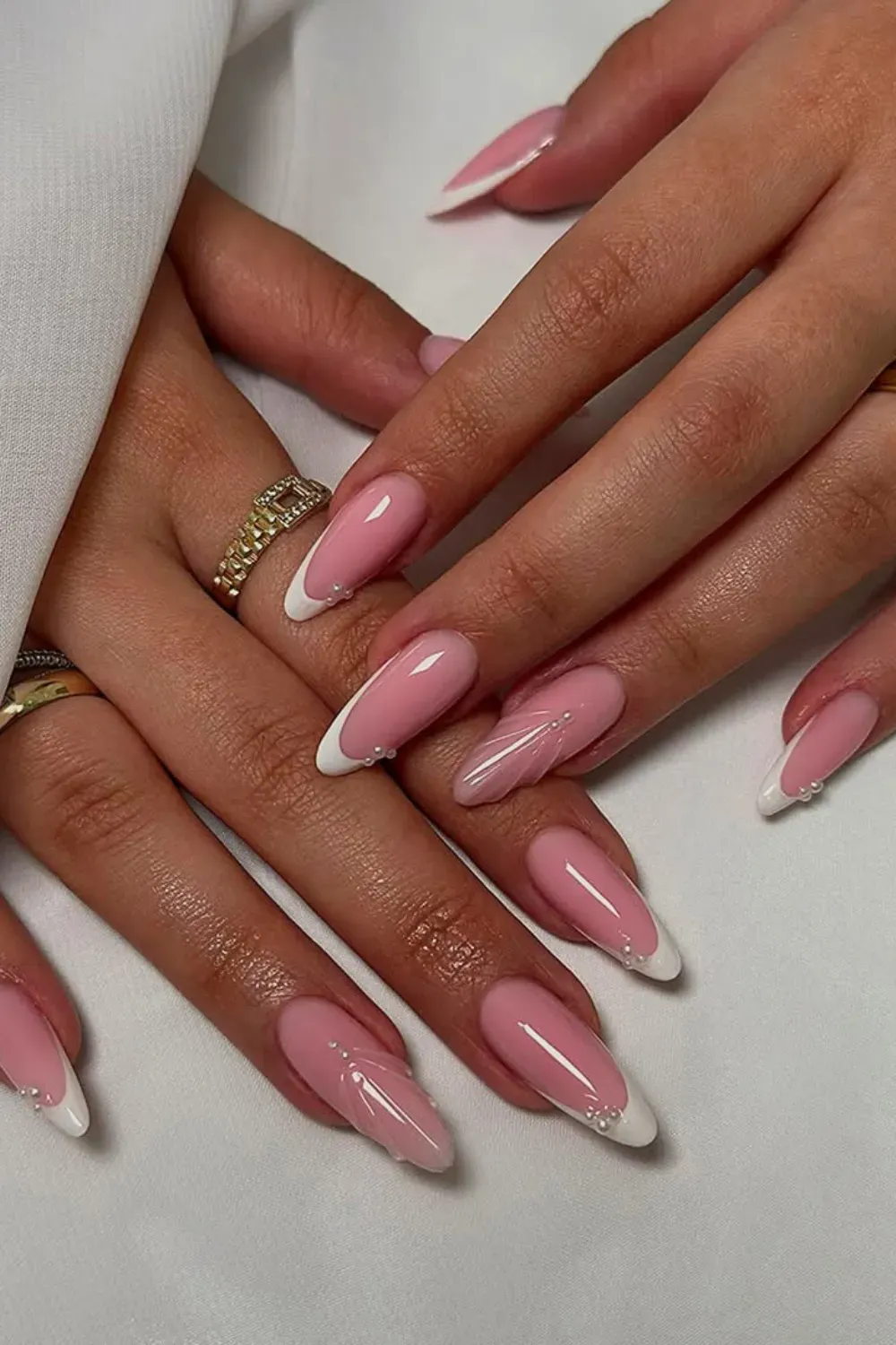 French nails with a raised relief design on the tips