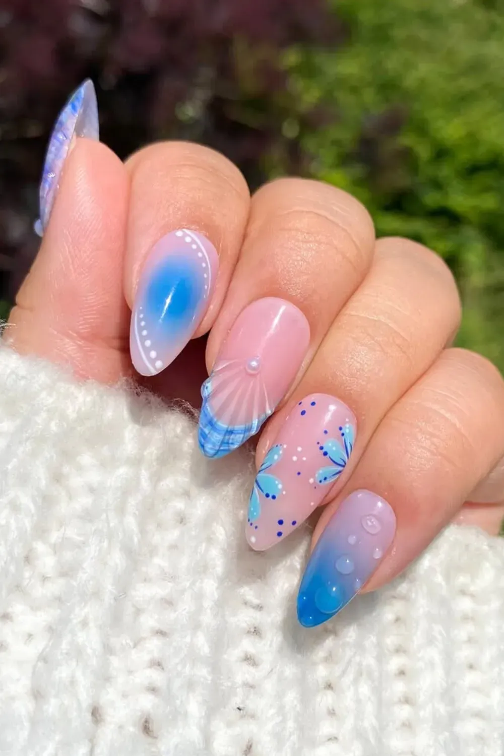 A vibrant blue-to-pink ombre design with summer vibes